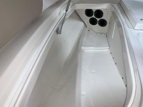 Interior view of 2026 Robalo 226 Cayman boat storage compartment.