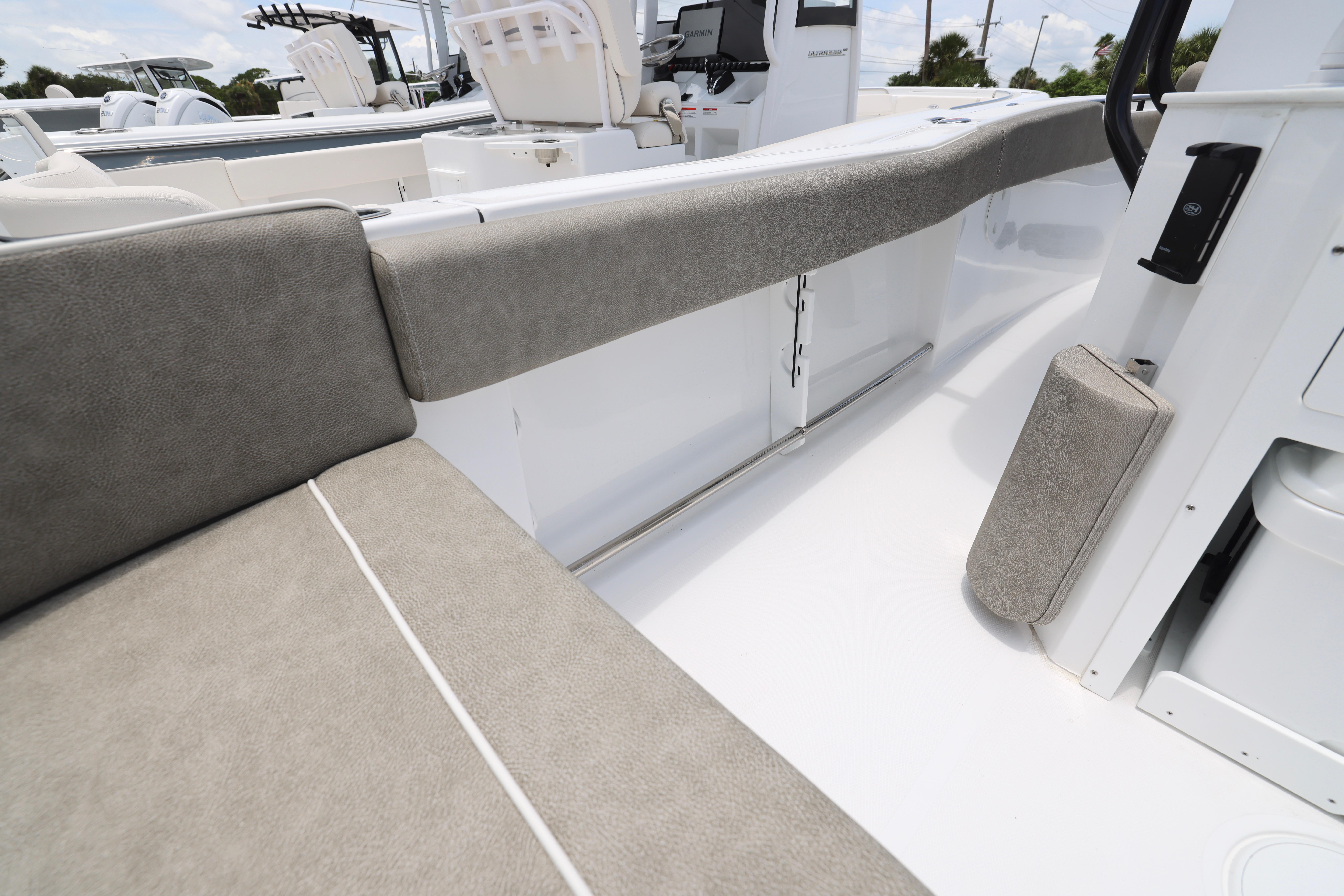 2026 Sea Hunt Ultra 245 SE boat interior with cushioned seating and modern design.
