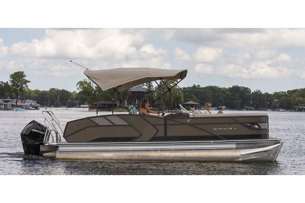 Manufacturer Provided Image: 2021 Crest Caribbean LX 250 SLS pontoon boat on a lake with canopy.