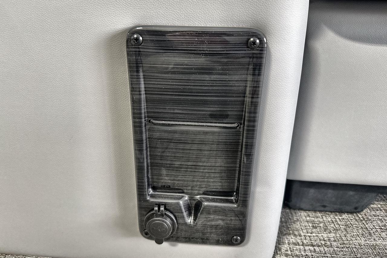 Control panel on 2026 Landau Island Breeze 23F boat interior.