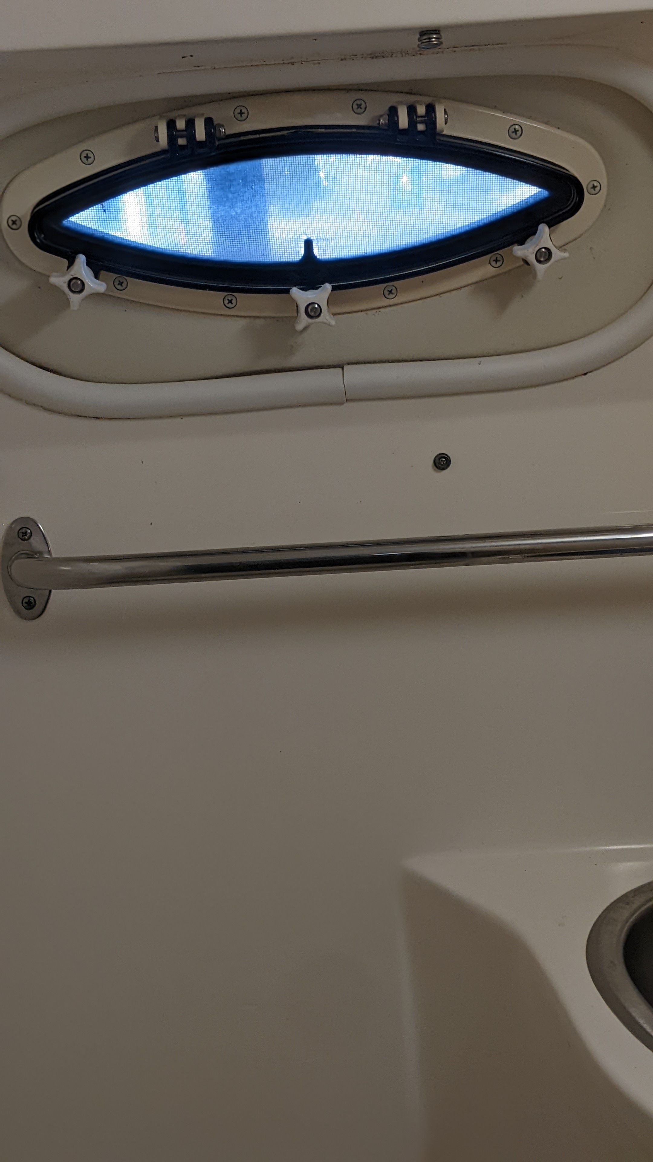 Interior view of a 2006 Rinker 250 EC boat window.