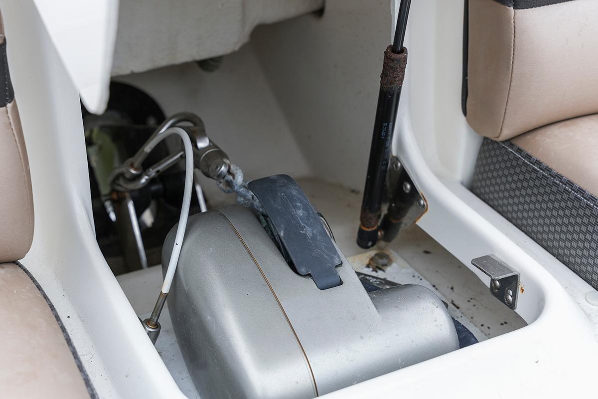 2018 Sea Ray SLX 350 interior detail showing mechanical components and seating area.