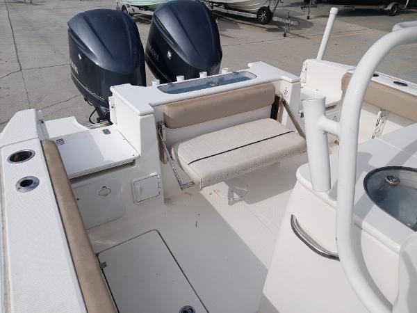 2015 Sea Fox 286 Commander boat interior with dual engines and seating area.