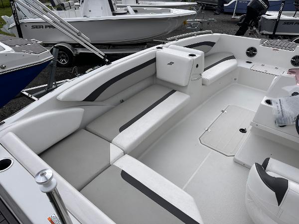 2024 Starcraft 171 SVX boat interior with white seating and modern design.