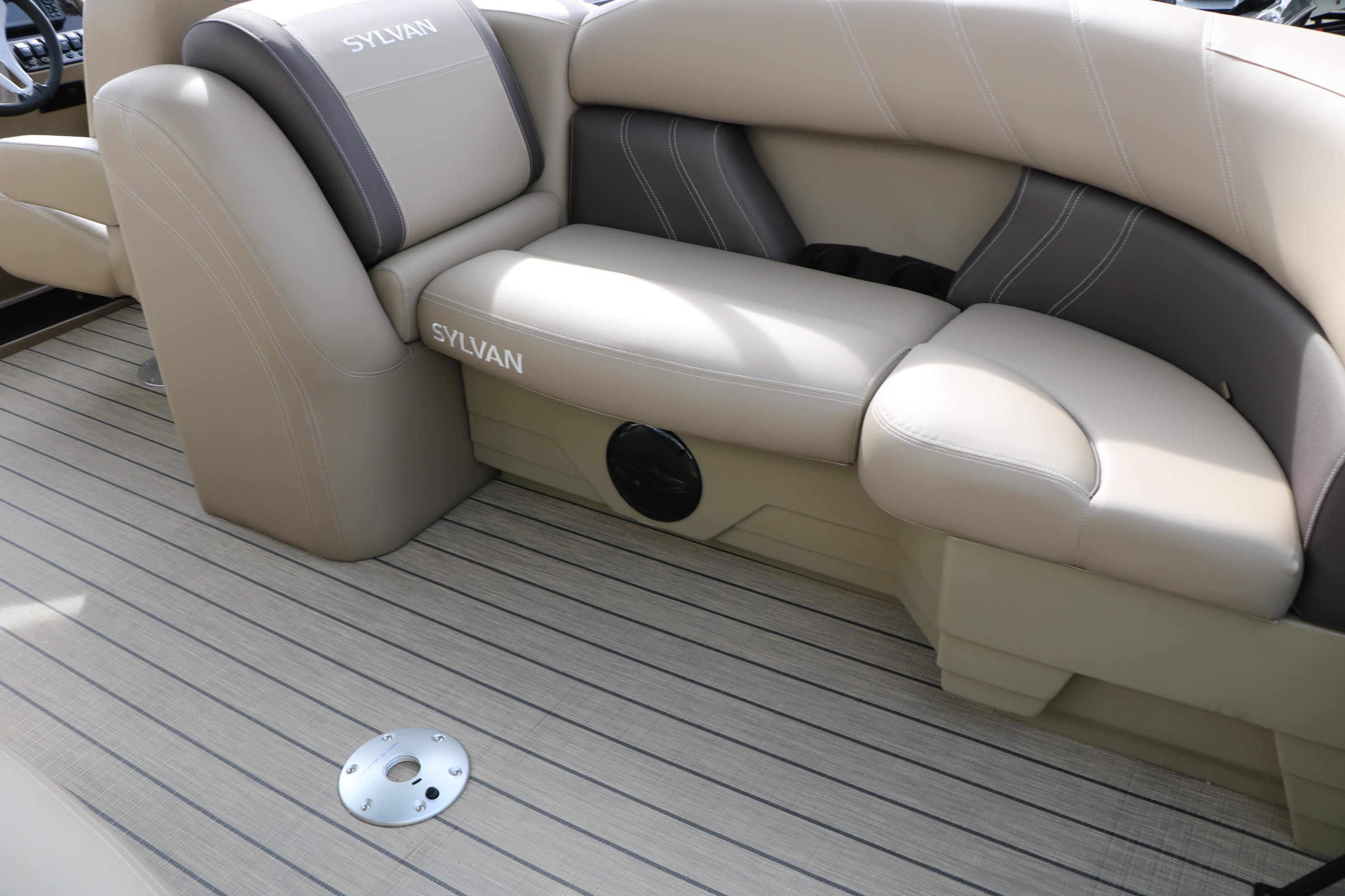 Luxurious seating on 2026 Sylvan Mirage 822 LZ pontoon boat with beige upholstery.
