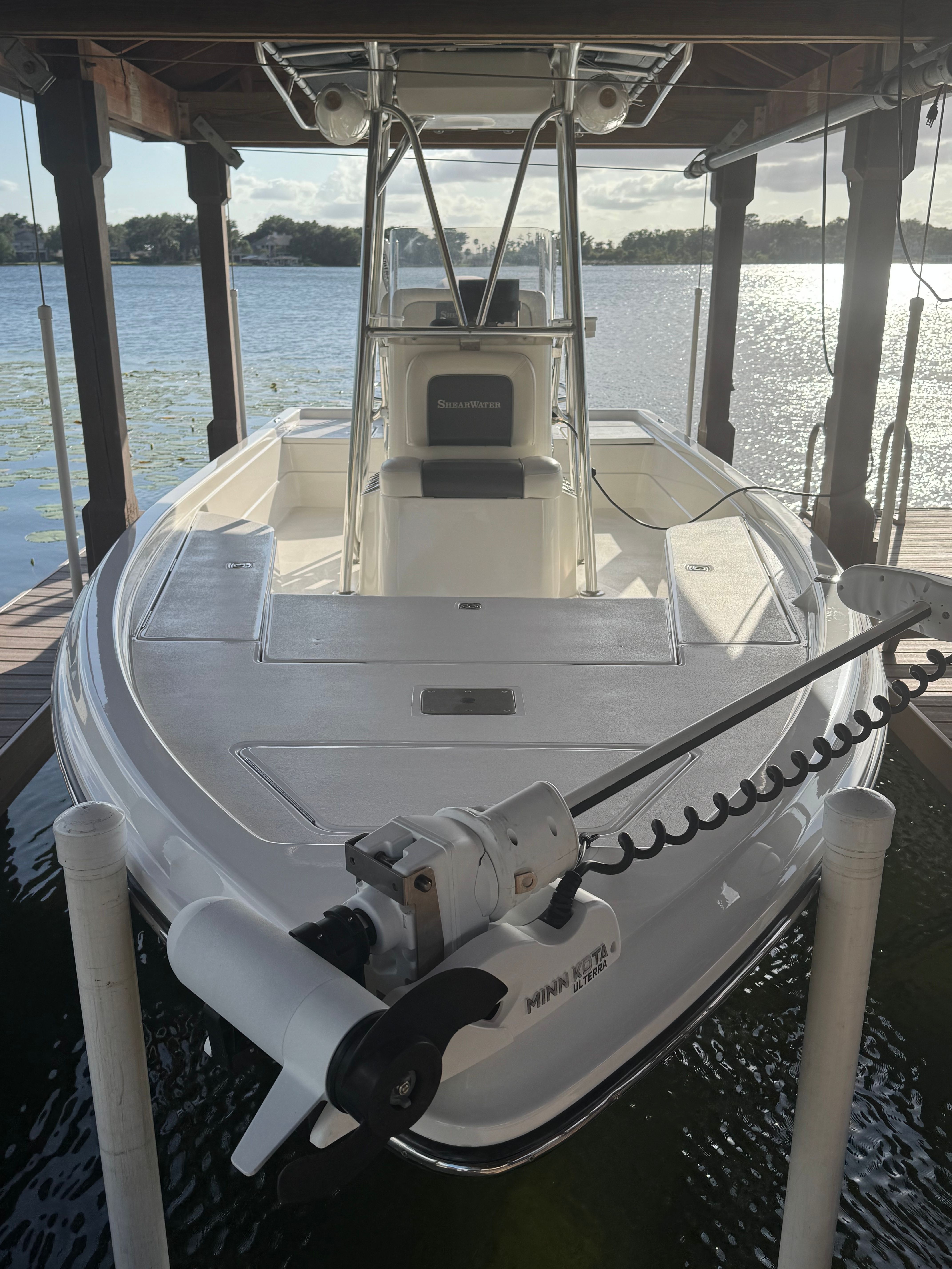 2004 ShearWater LTZ boat in a covered dock.