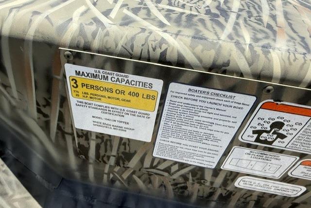 2026 Tracker Grizzly 15 Jon boat capacity label and safety checklist.