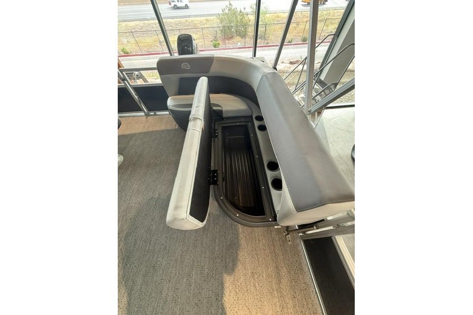 2026 Sun Tracker Bass Buggy 16 XL Select interior seating with storage compartment.