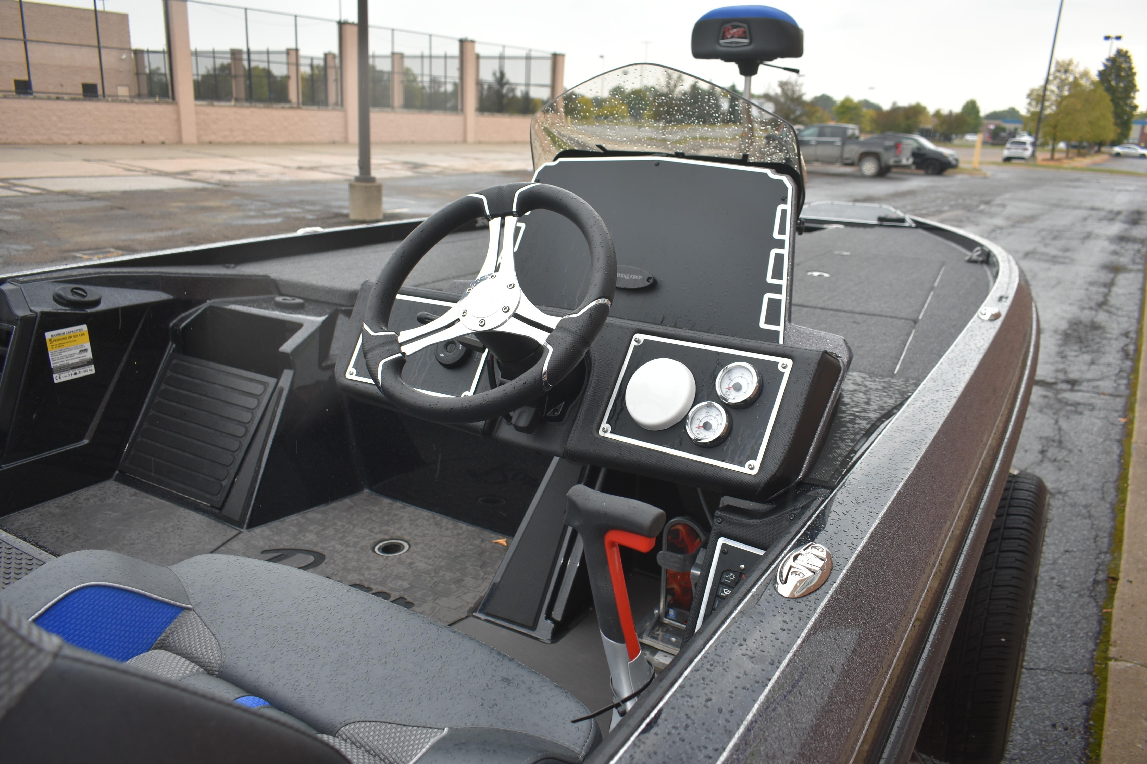 2025 Ranger Z521 boat interior with steering wheel and dashboard controls.