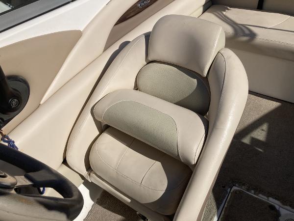 2008 Chaparral 210 SSi boat interior with beige leather seating.