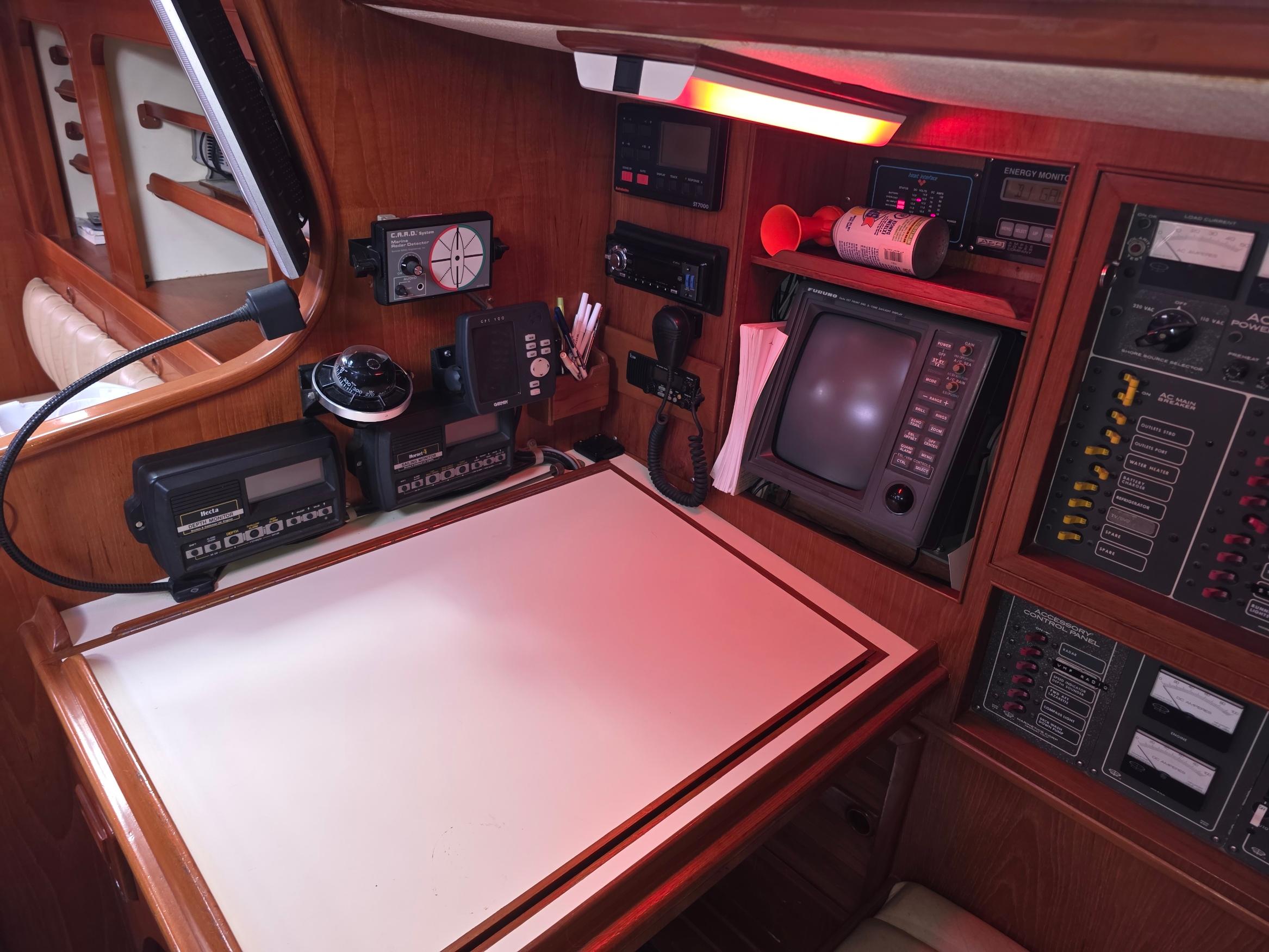 Navigation station on a 1982 Stevens 40" yacht with instruments and control panels.