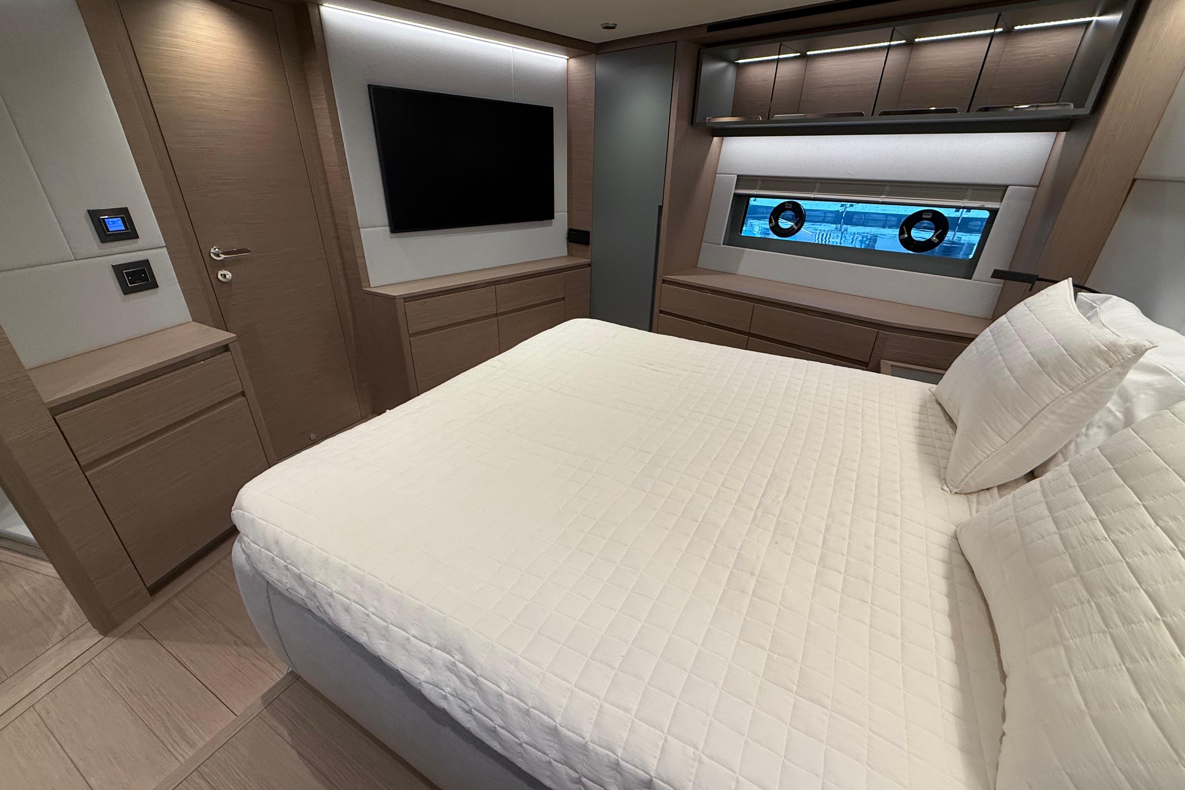 Luxurious bedroom interior of 2026 Pardo Yachts GT75 with modern design and elegant furnishings.