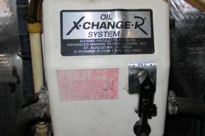 Oil X-Change-R System in 2012 Regal 42 Sport Coupe engine room.