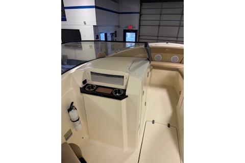 2021 Scout 215 Dorado boat interior with dashboard and seating area.