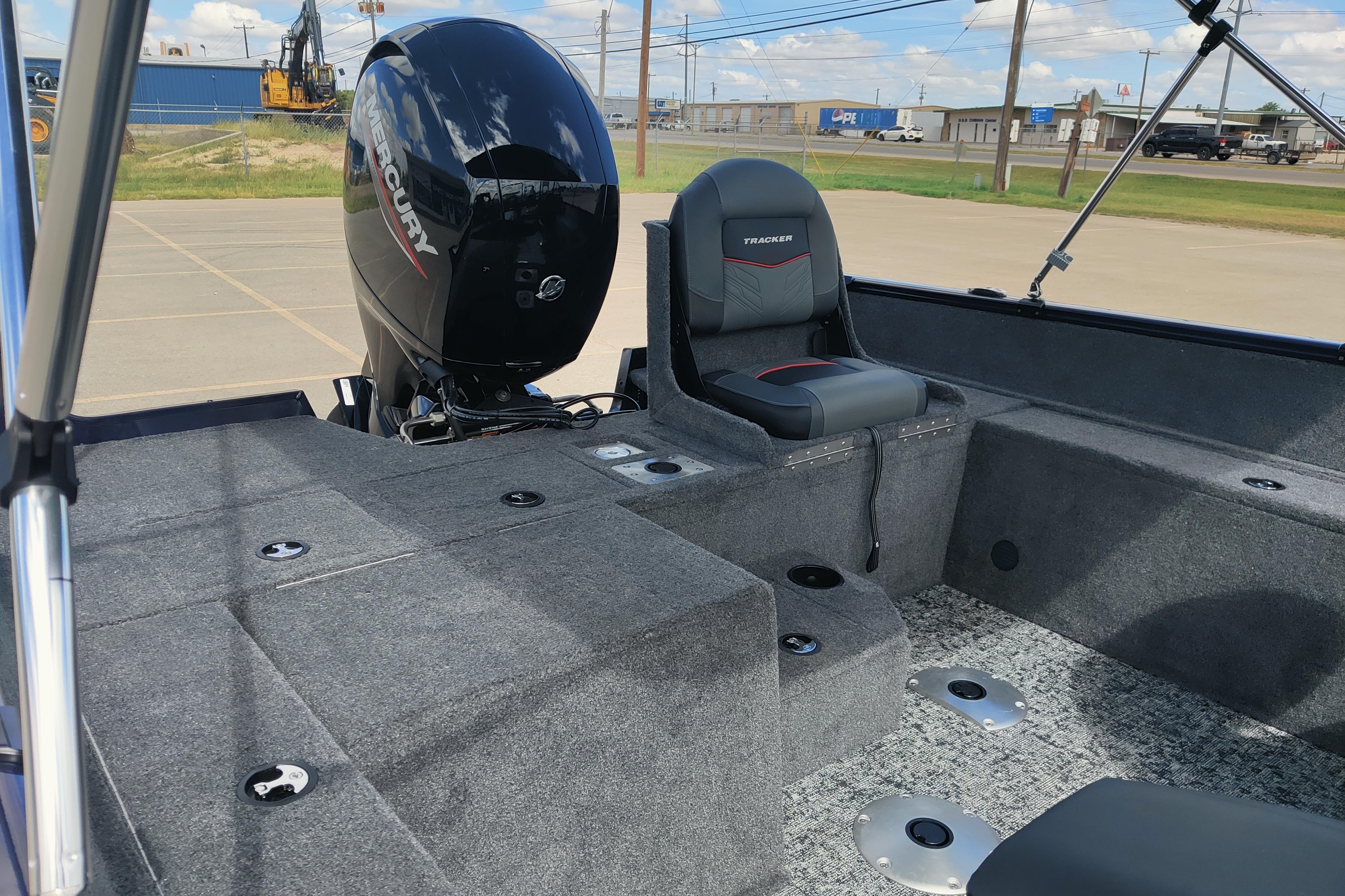2026 Tracker Pro Guide V-175 Combo boat interior with Mercury engine, featuring seating and storage.