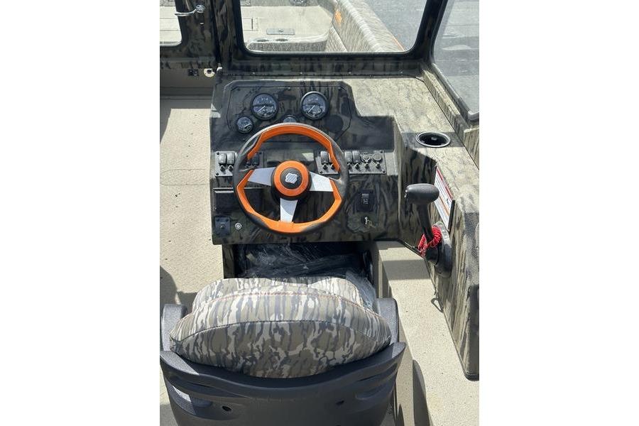 2026 SeaArk EasyCat boat dashboard with orange steering wheel and camo seat.