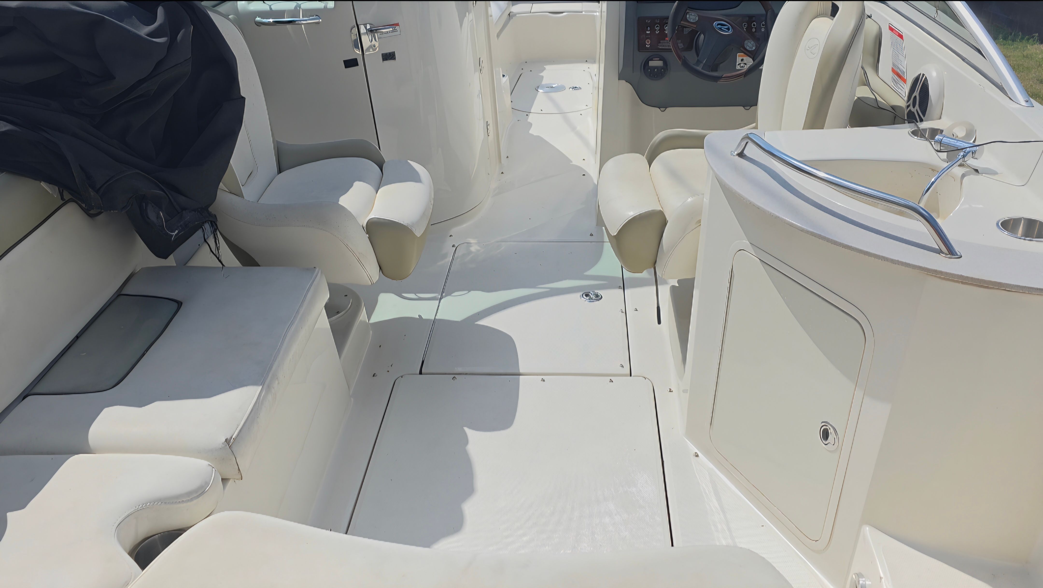 Interior of a 2007 Sea Ray 260 Sundeck boat with seating area.