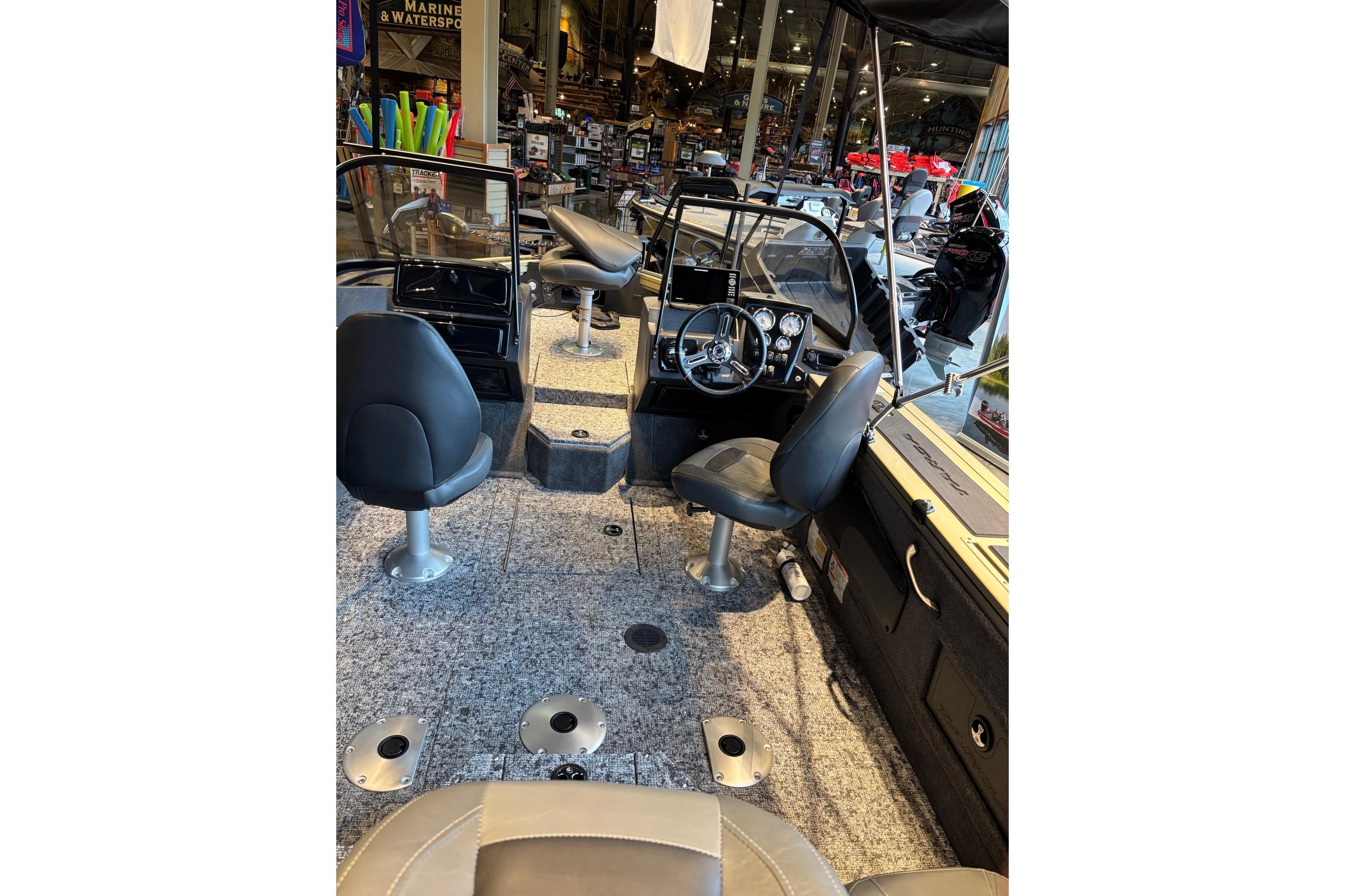 Interior of 2026 Tracker Targa V-18 Combo boat with seating and dashboard.