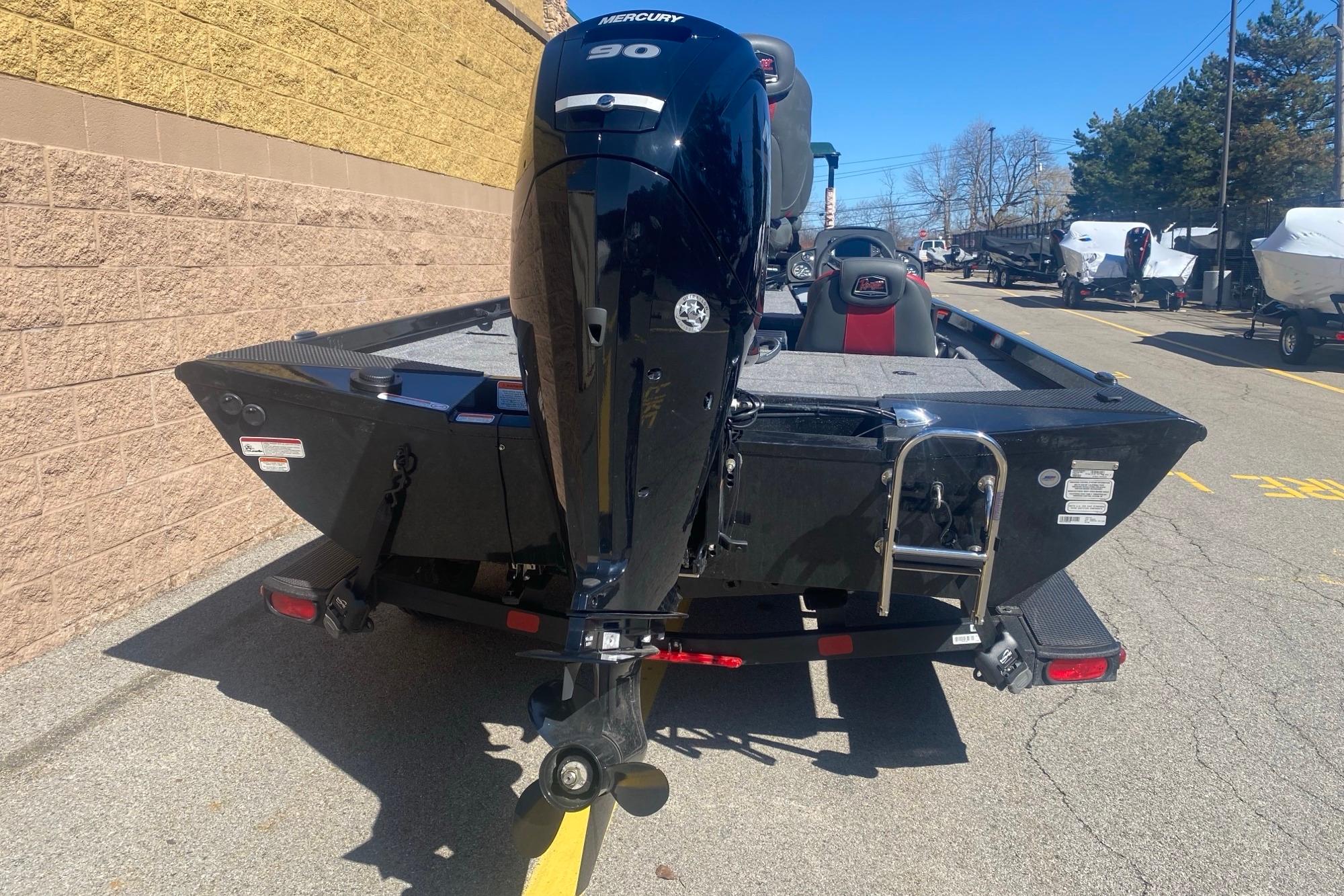 2026 Ranger RT188 boat with Mercury 90 engine, parked outdoors.