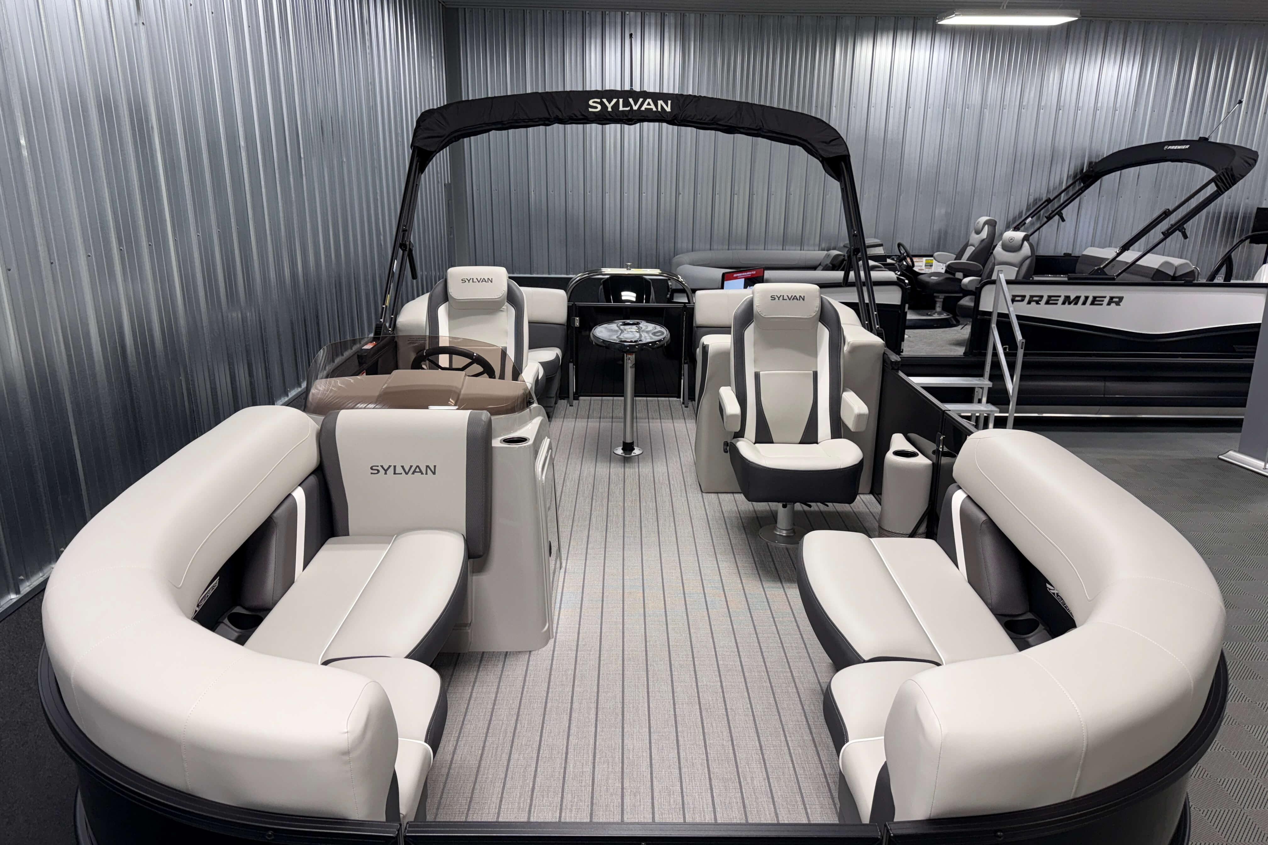 2026 Sylvan Mirage X1 pontoon boat with spacious seating and modern design.