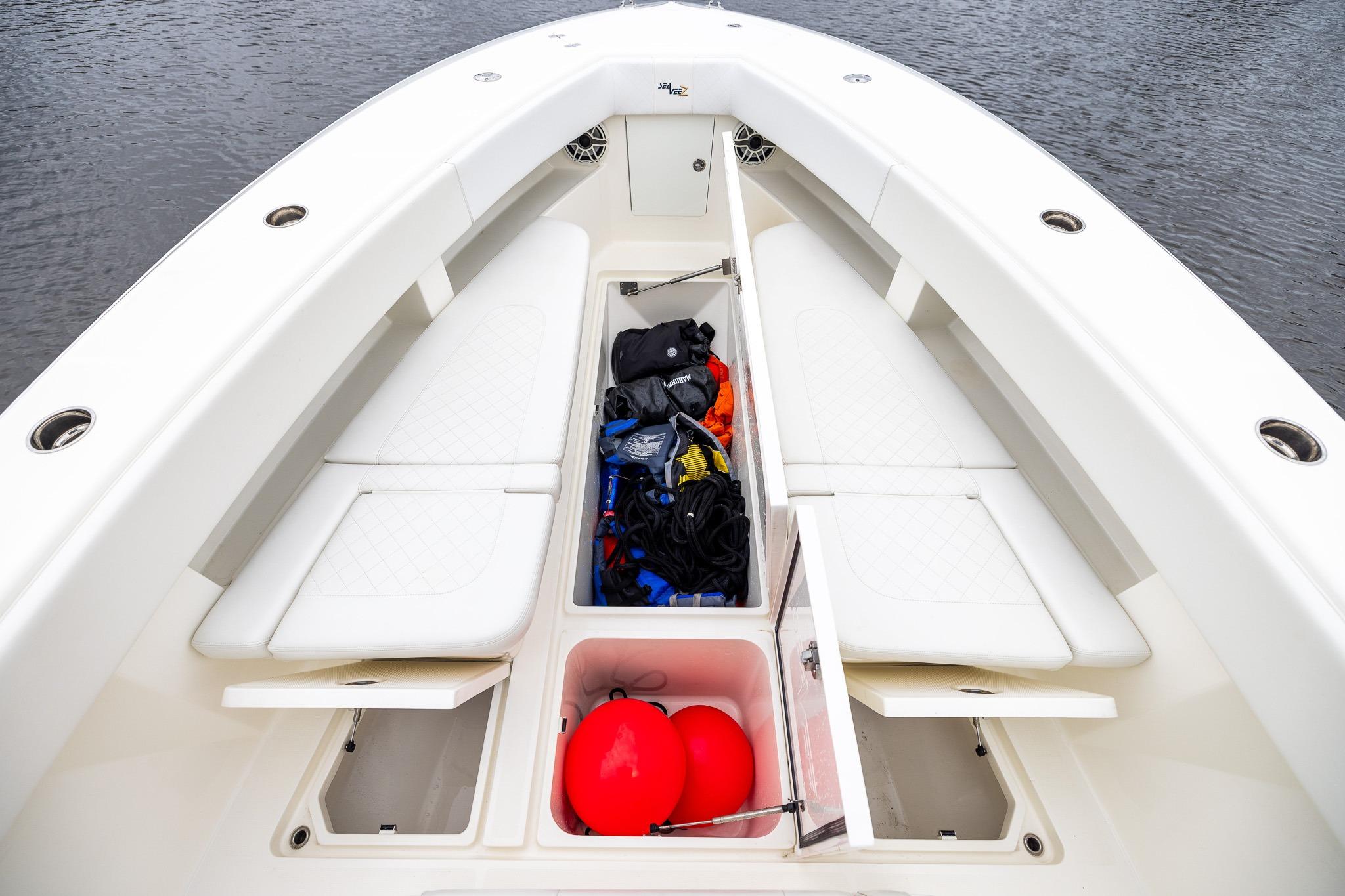 2019 SeaVee 322Z boat interior with open storage compartments and seating.