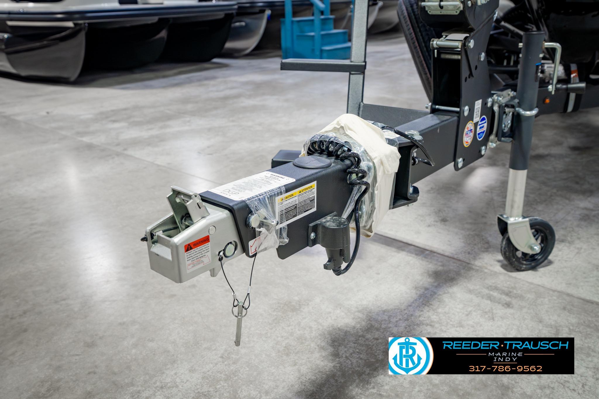 Trailer hitch of 2026 Lund 1875 Impact XS in a showroom setting.