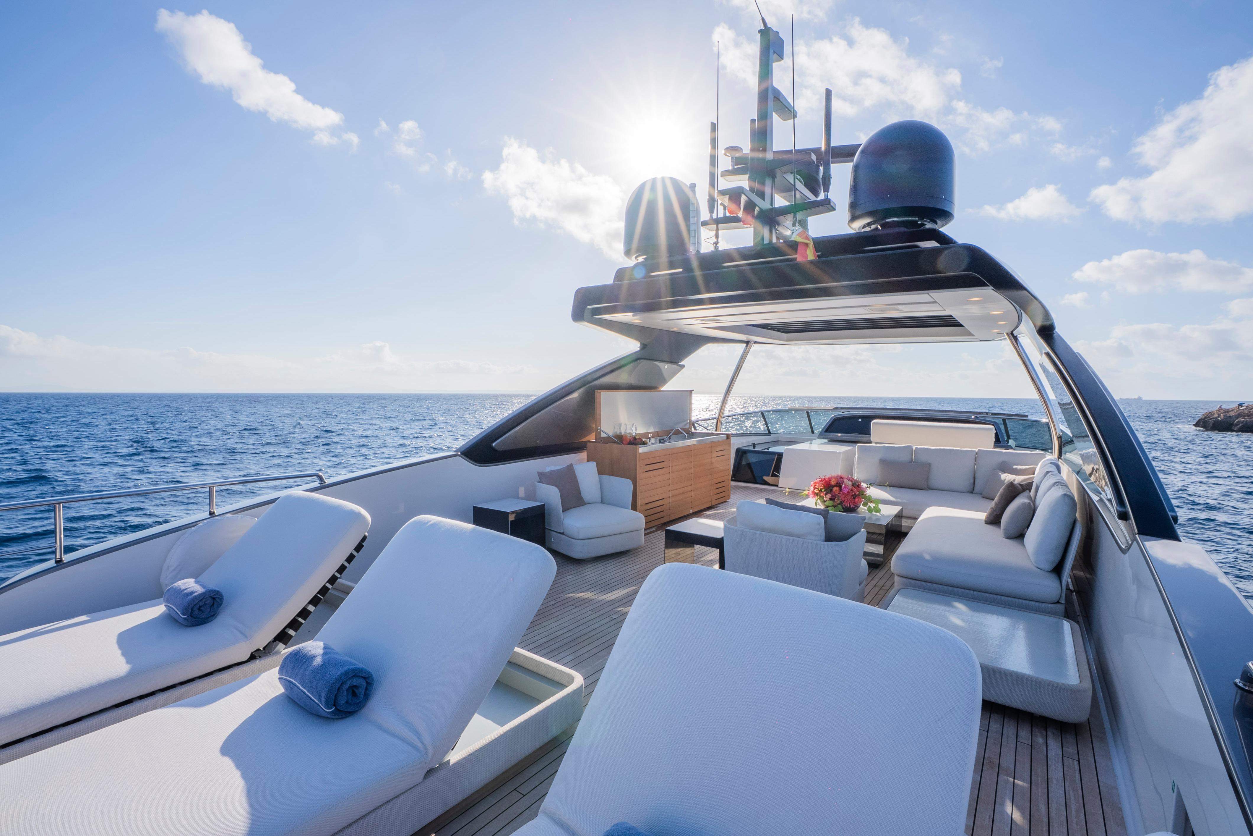 Luxurious 2024 Sanlorenzo SL86 yacht deck with sun loungers and ocean view.