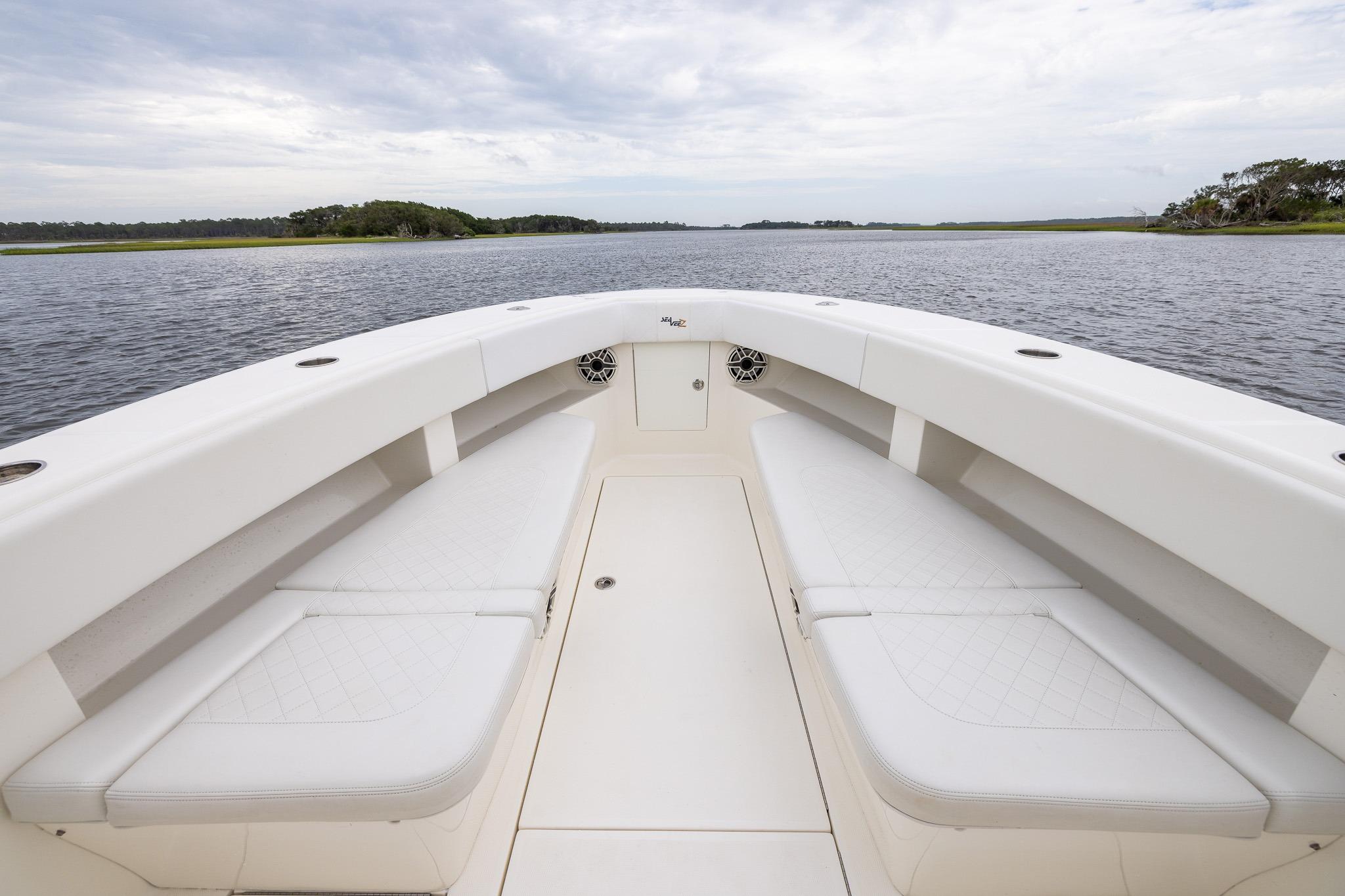 2019 SeaVee 322Z boat interior with white seating, open water view.