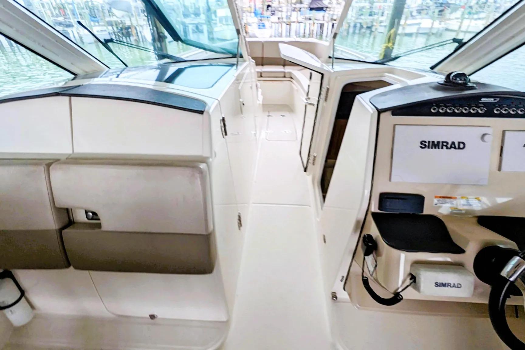 Interior view of a 2017 Boston Whaler 320 Vantage boat with Simrad navigation system.