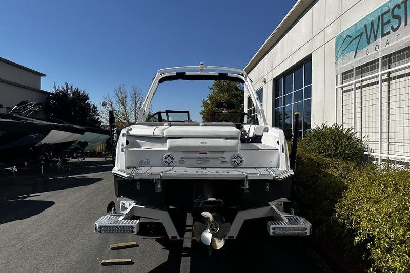 2025 Cobalt CS23 boat displayed outdoors at a dealership.