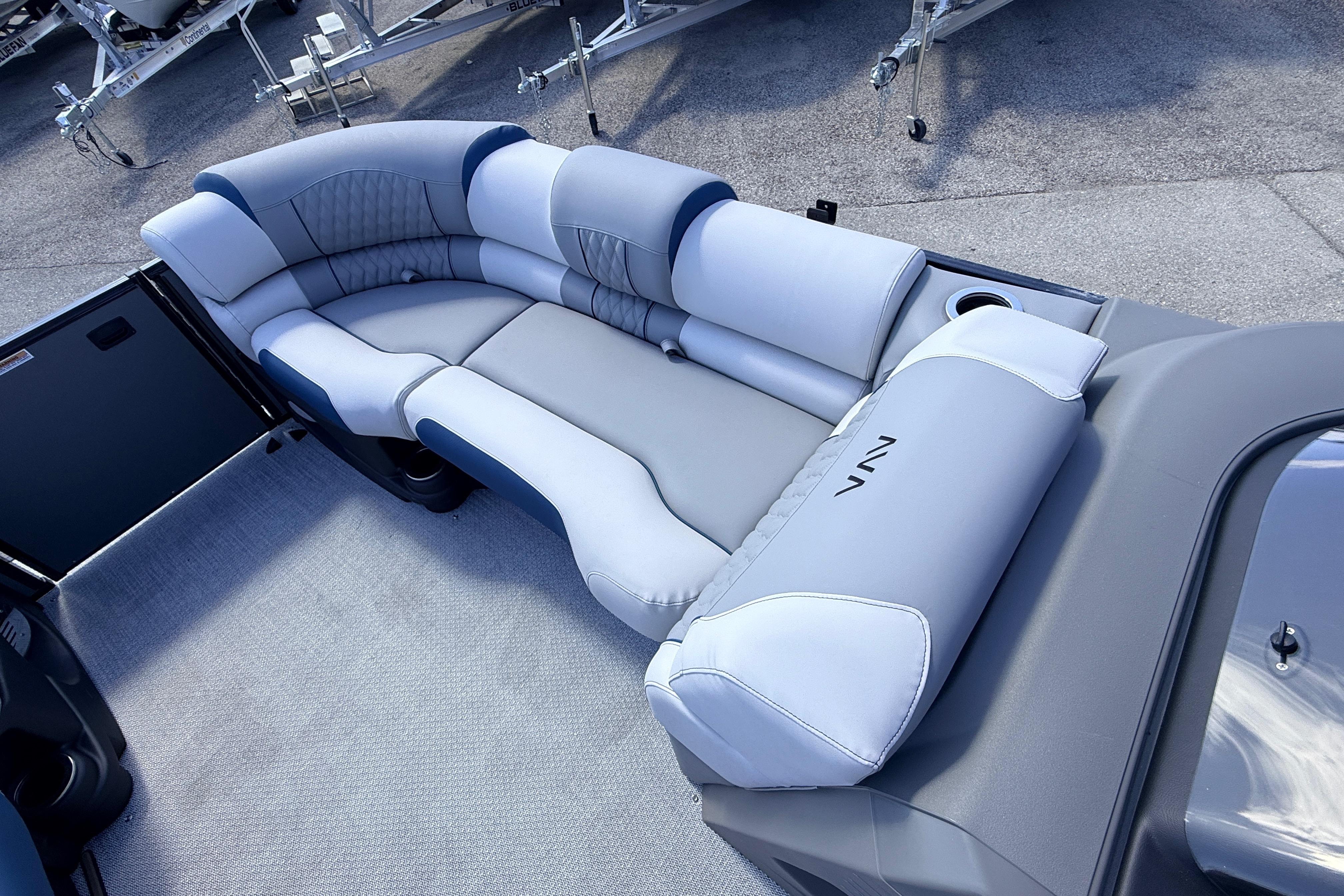Luxurious seating on 2026 Avalon 2385 Catalina Quad Lounger, Tri Toon High Performance boat.