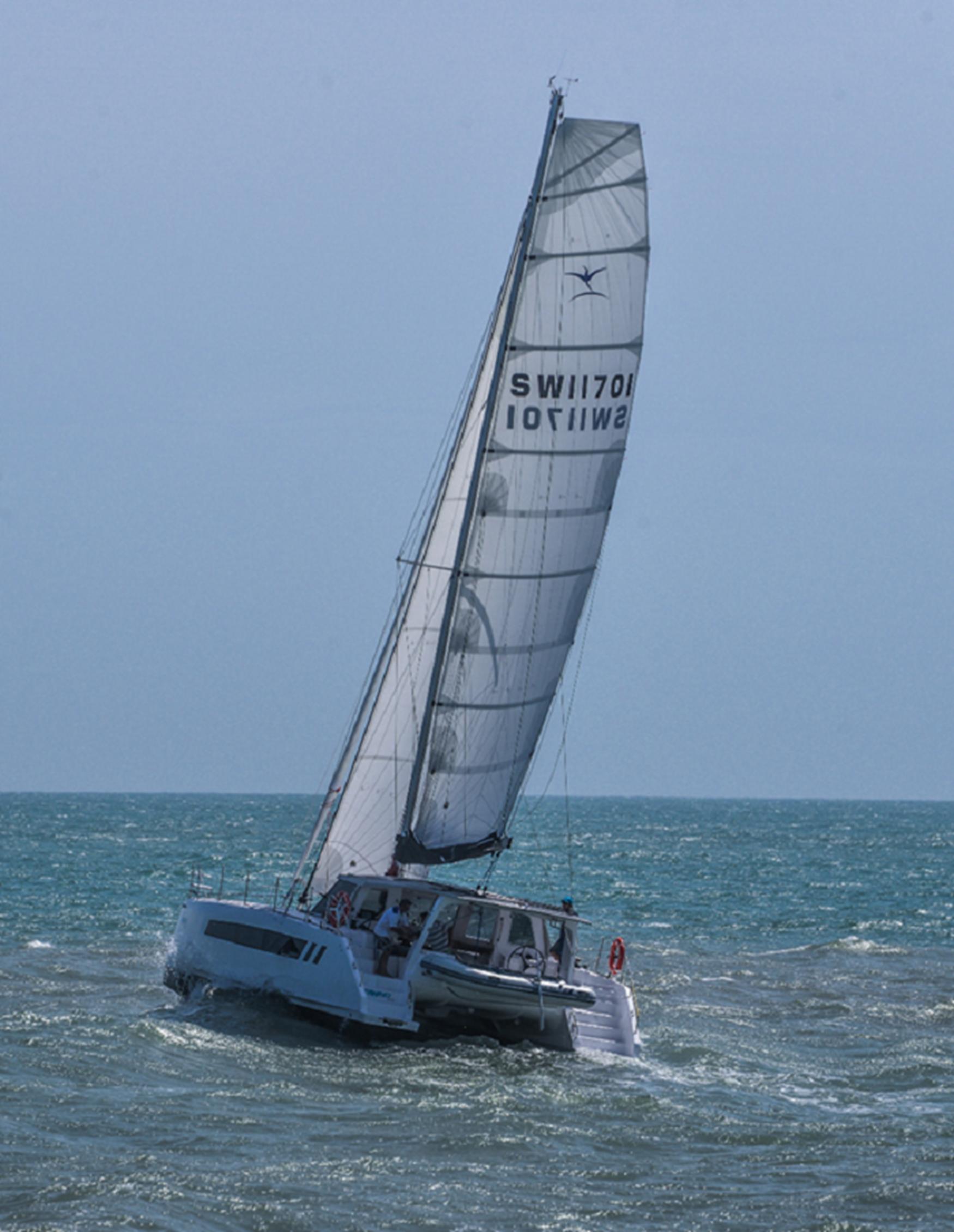 2025 Seawind 1170 sailing catamaran on open water.