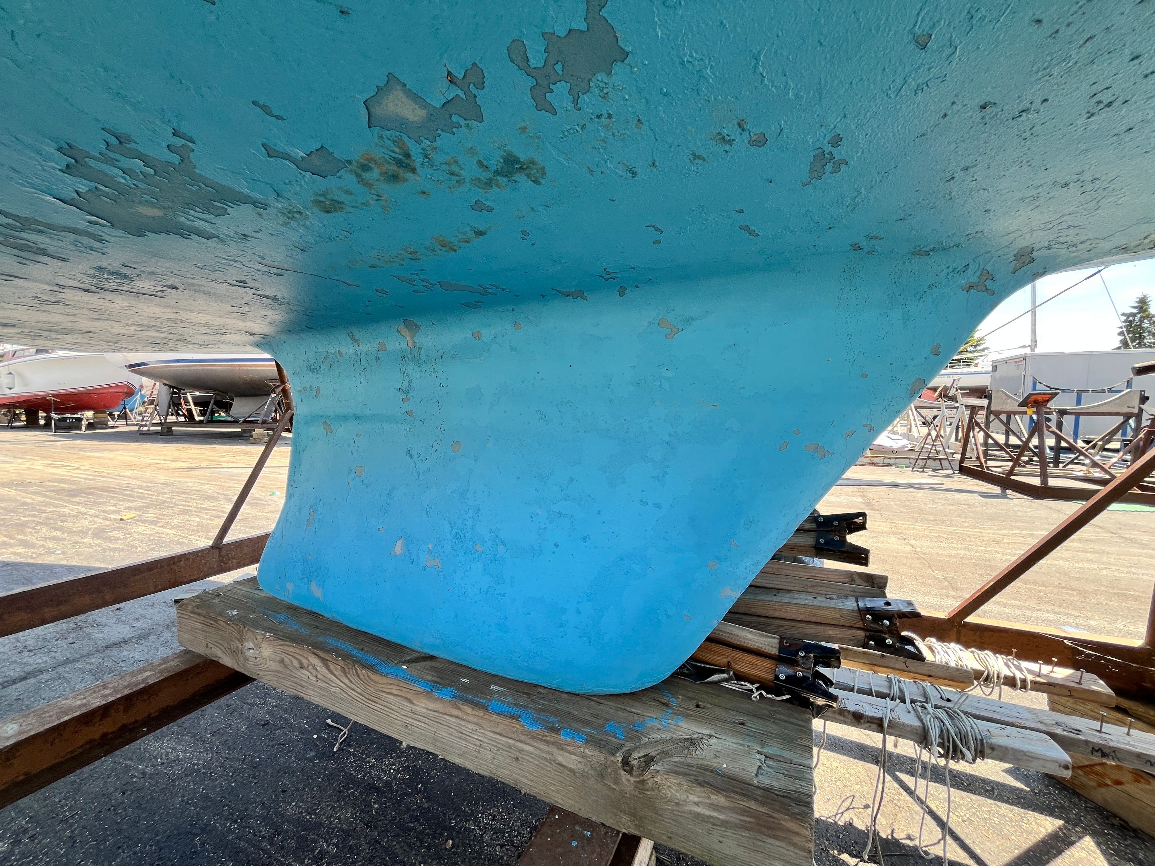 Underside of a 1974 Capital Newport 30 MKII on a stand.