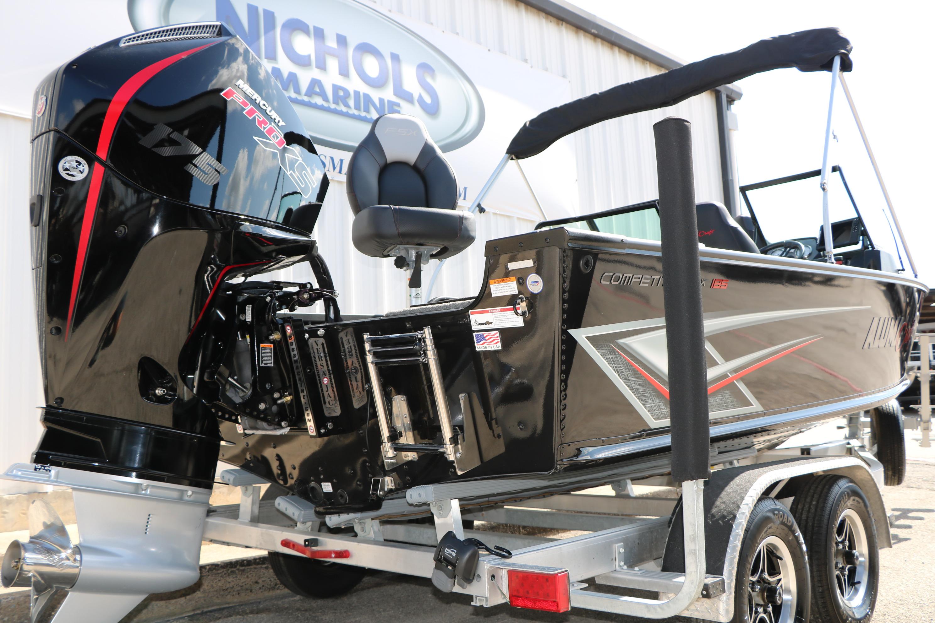 2023 Alumacraft Competitor FSX 185 boat with Mercury 175 engine on trailer.
