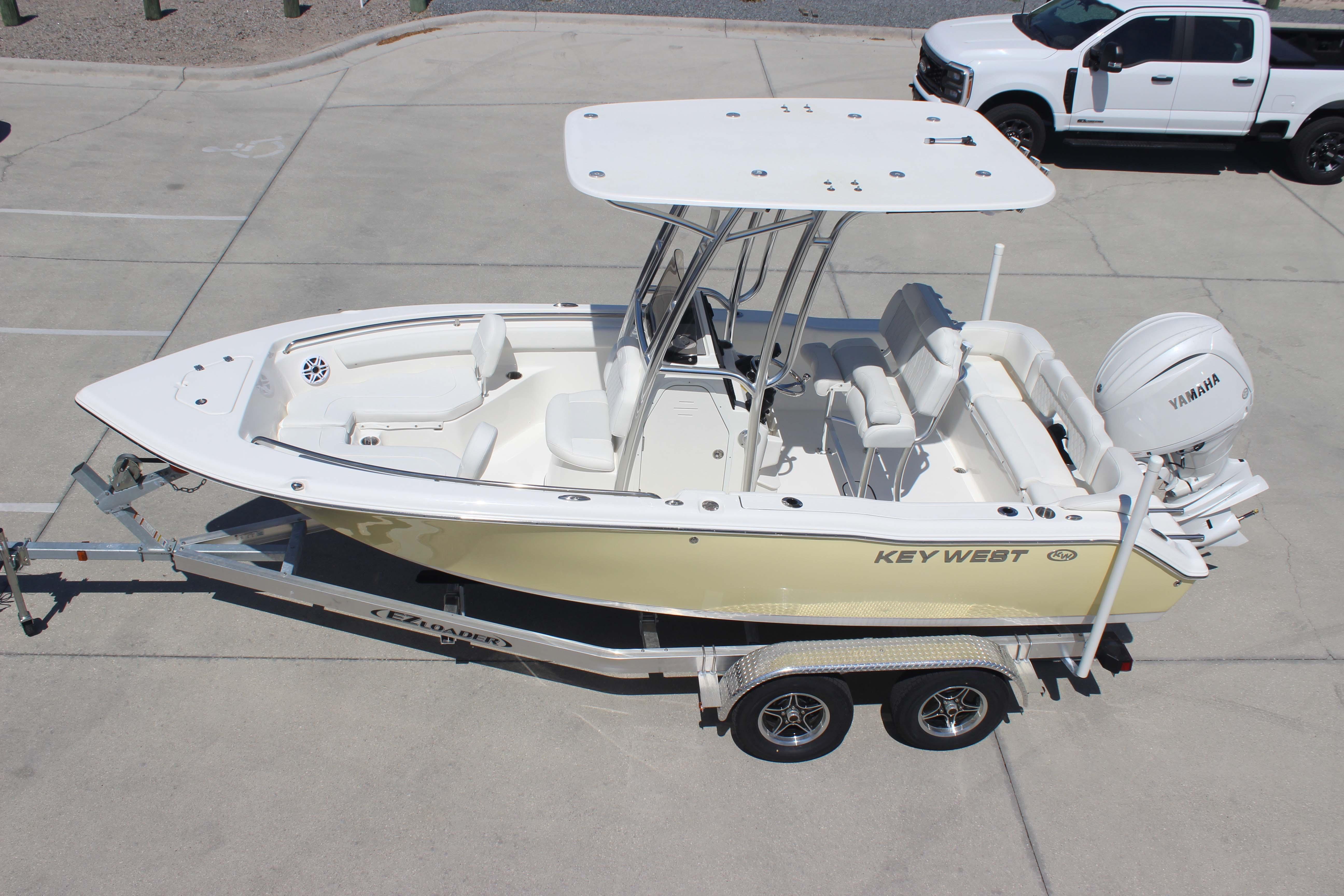 2026 Key West 203 FS boat on trailer, featuring Yamaha engine, parked in lot.
