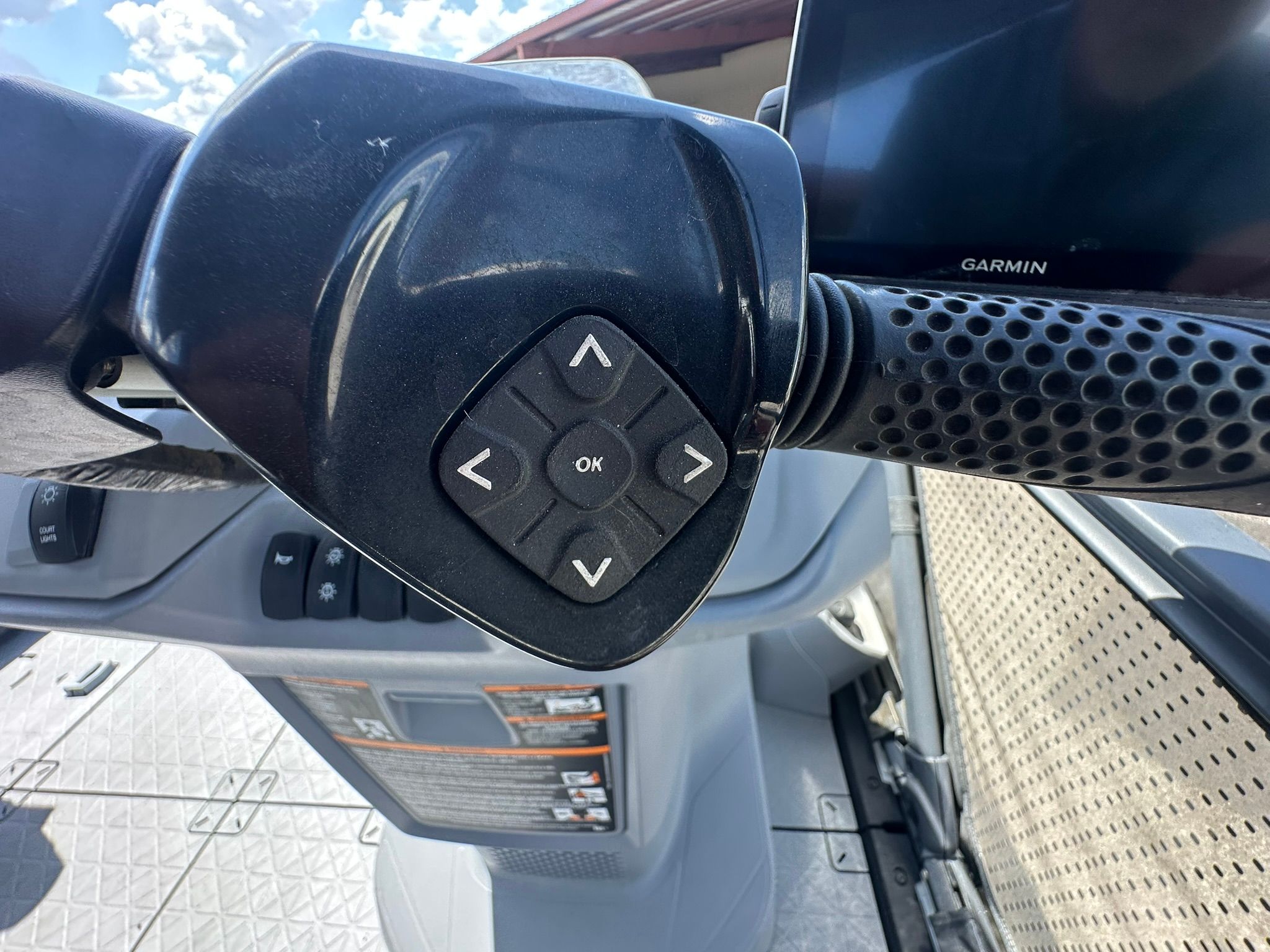 Close-up of the control area on a Sea-Doo 21 SWITCH SPORT with controls and display.