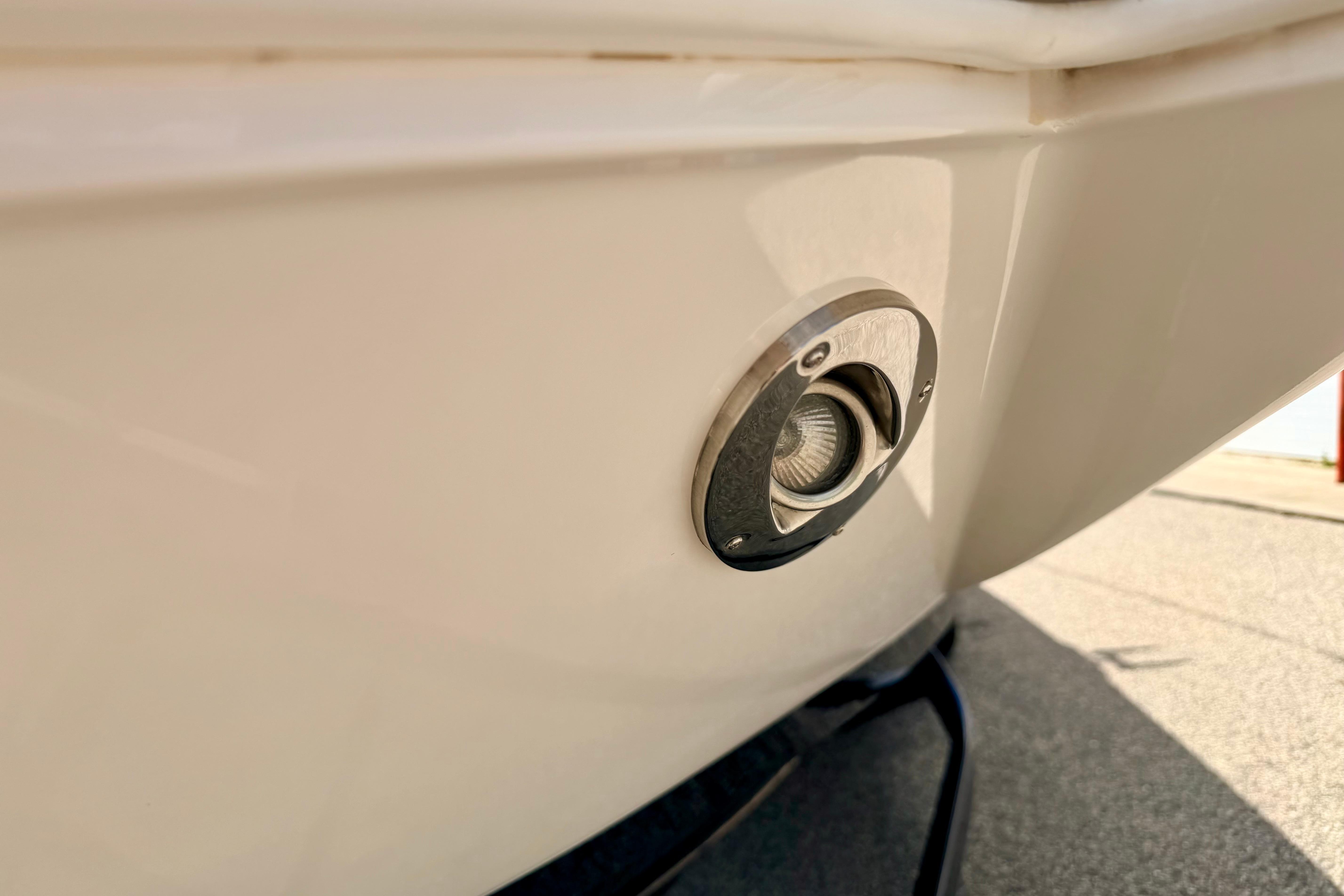 Close-up of a 2015 Chaparral Sunesta 264 boat's underwater light fixture.