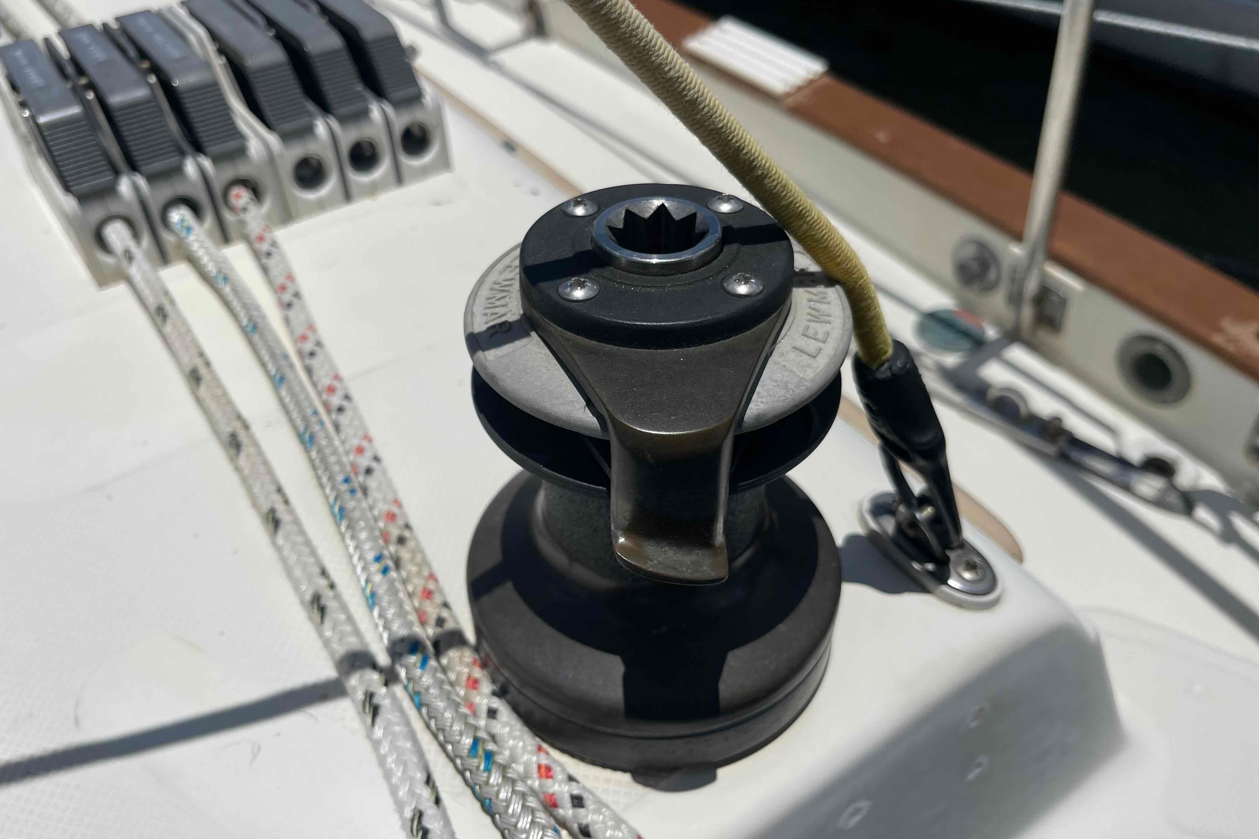 Winch and ropes on 1987 Pacific Seacraft 34 sailboat deck.