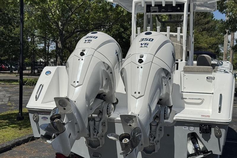 2026 Sea Hunt Gamefish 30 with twin 350 V6 engines, rear view.