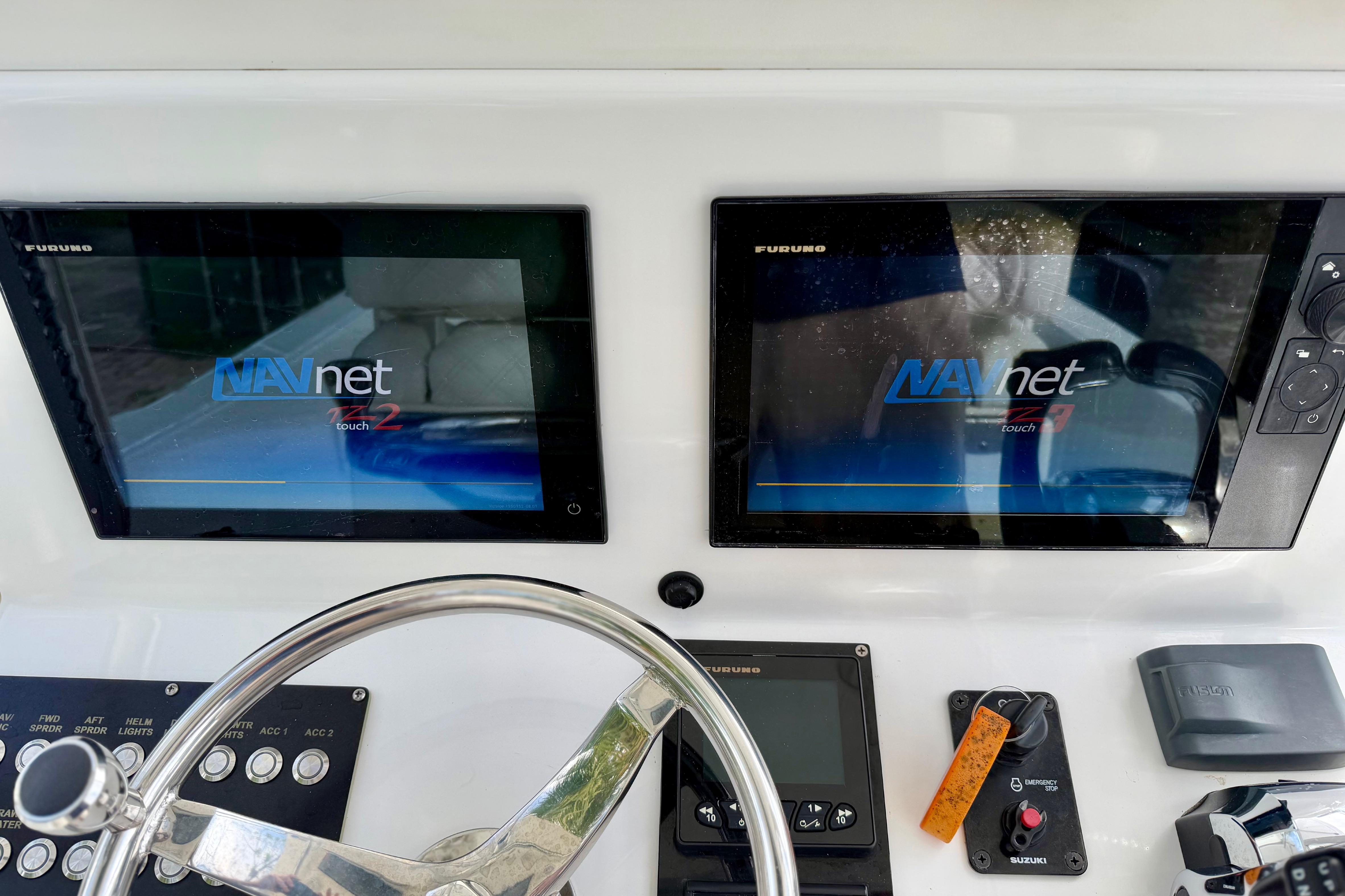 Dashboard of 2025 Ocean Master 296 Center Console with dual NAVnet touch screens.