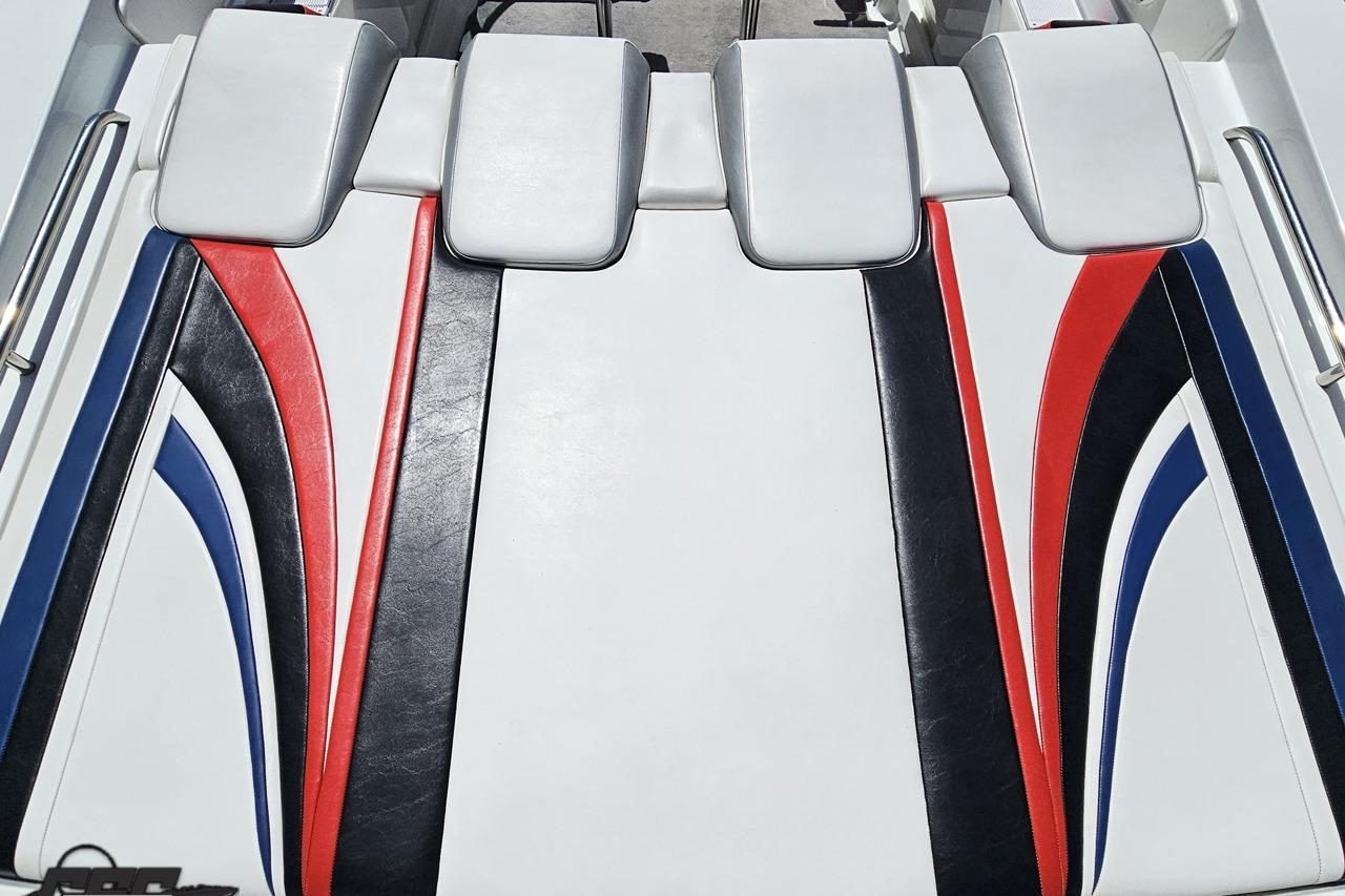 2005 Formula 271 FASTech boat upholstery with red, blue, and black accents.