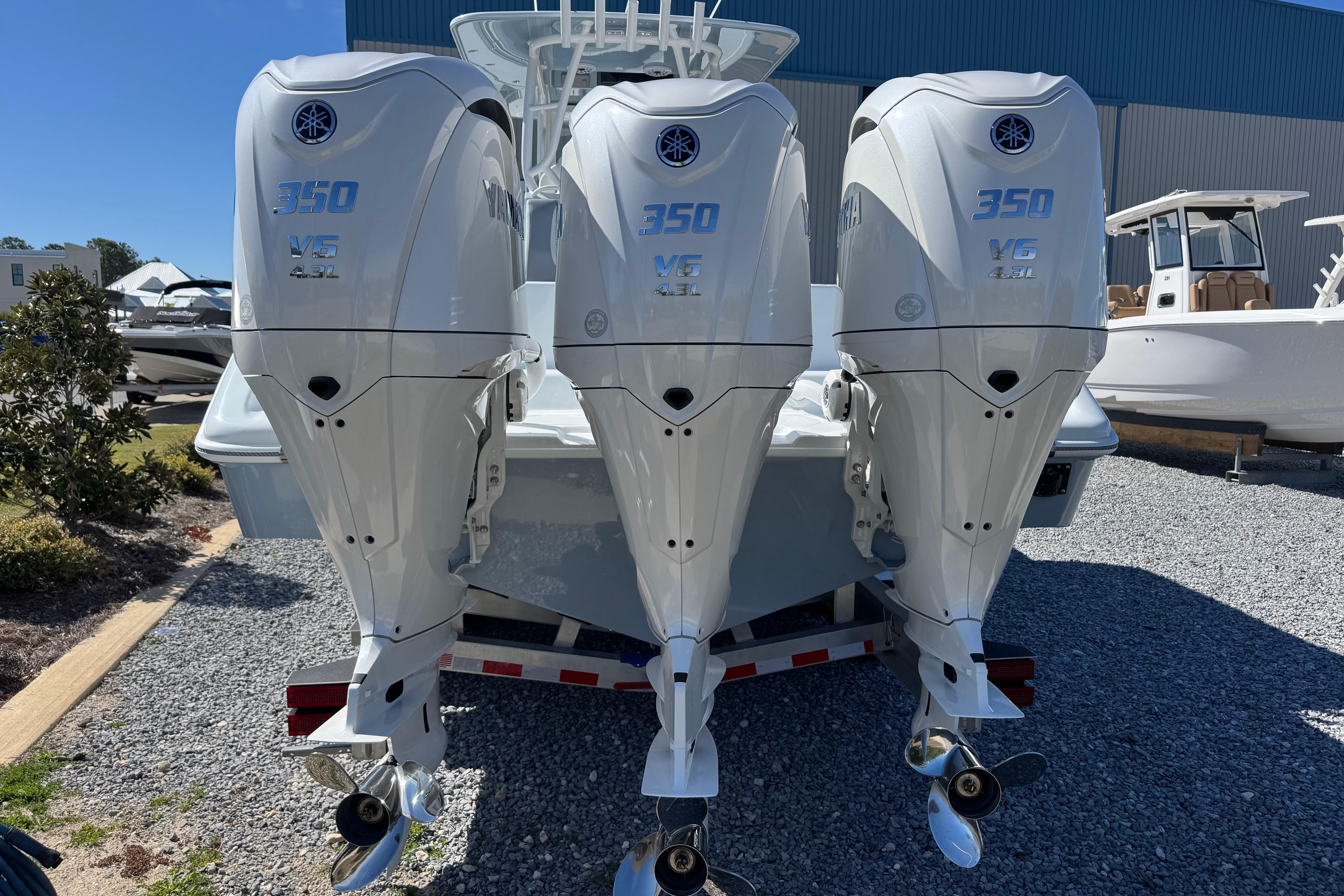 2026 Yellowfin 36 Offshore boat with triple Yamaha 350 V6 outboard engines.