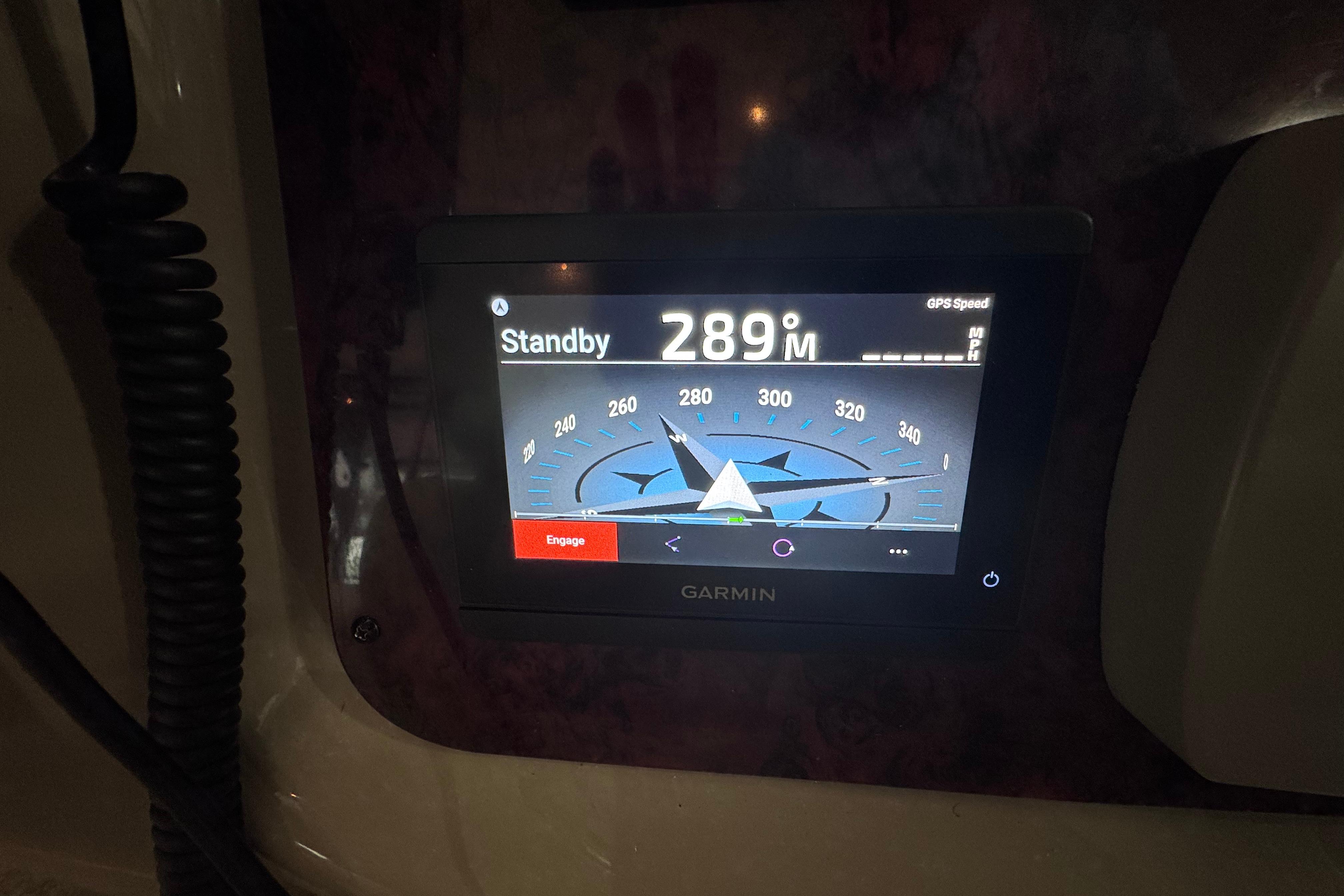 Garmin navigation display on 2004 Sea Ray 390 Motor Yacht, showing compass and speed.