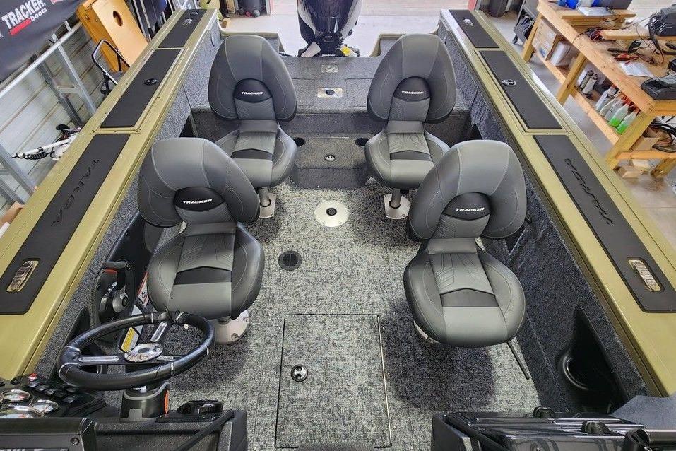 2026 Tracker Targa 185 WT boat interior with four seats and steering wheel.