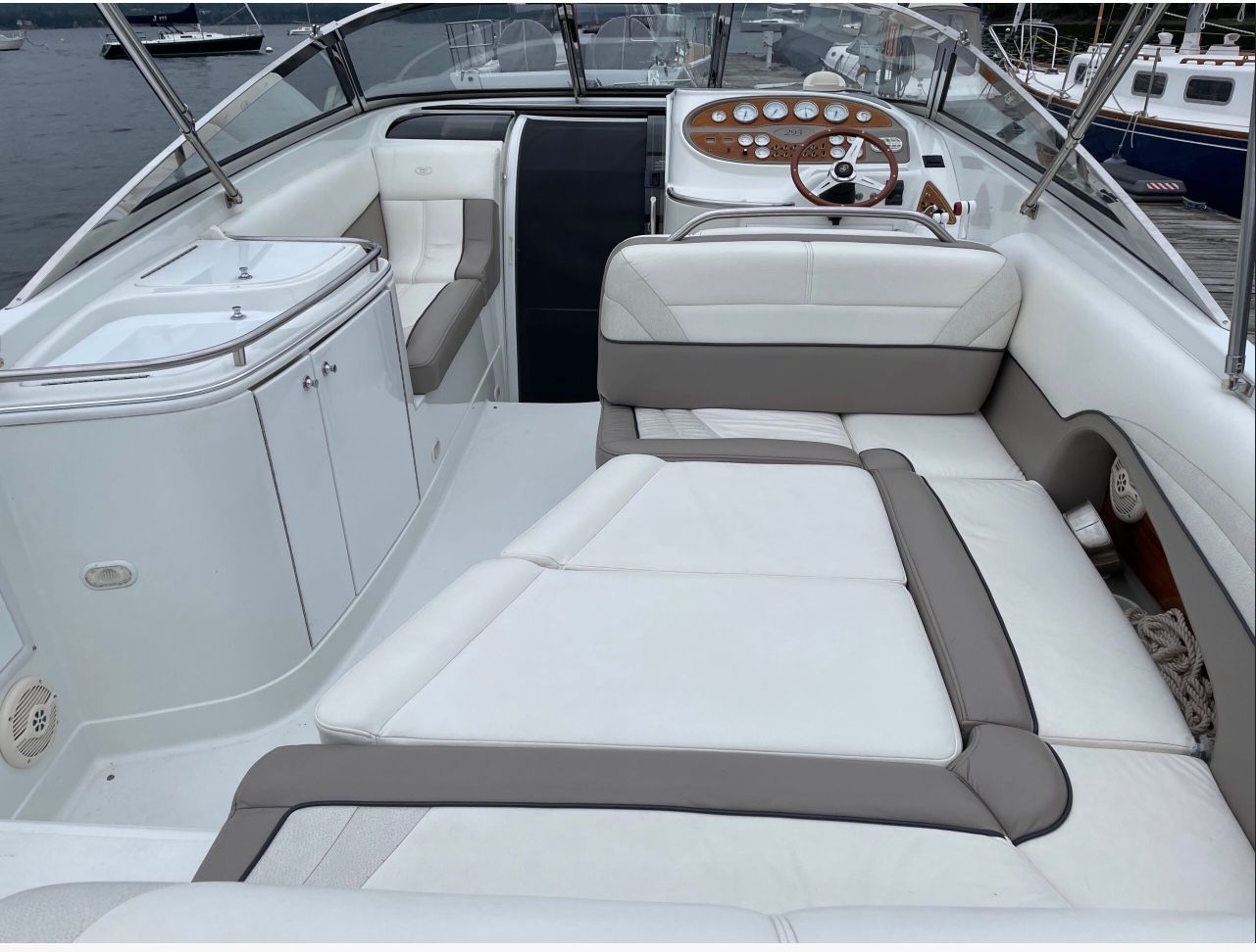 Interior of a 1999 Cobalt 293 boat with white and gray upholstery.