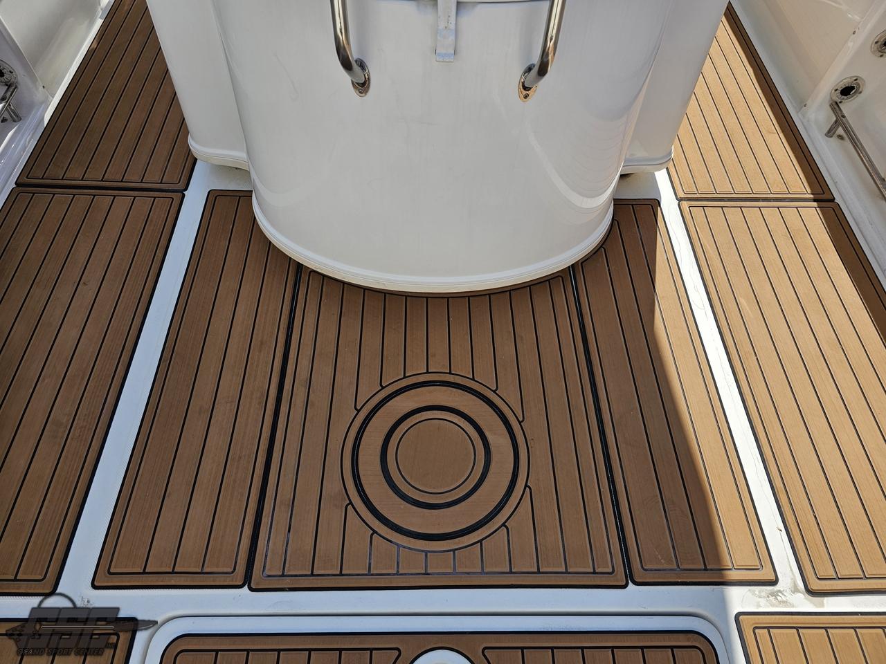 2007 Triton 351 CC boat deck with teak flooring.