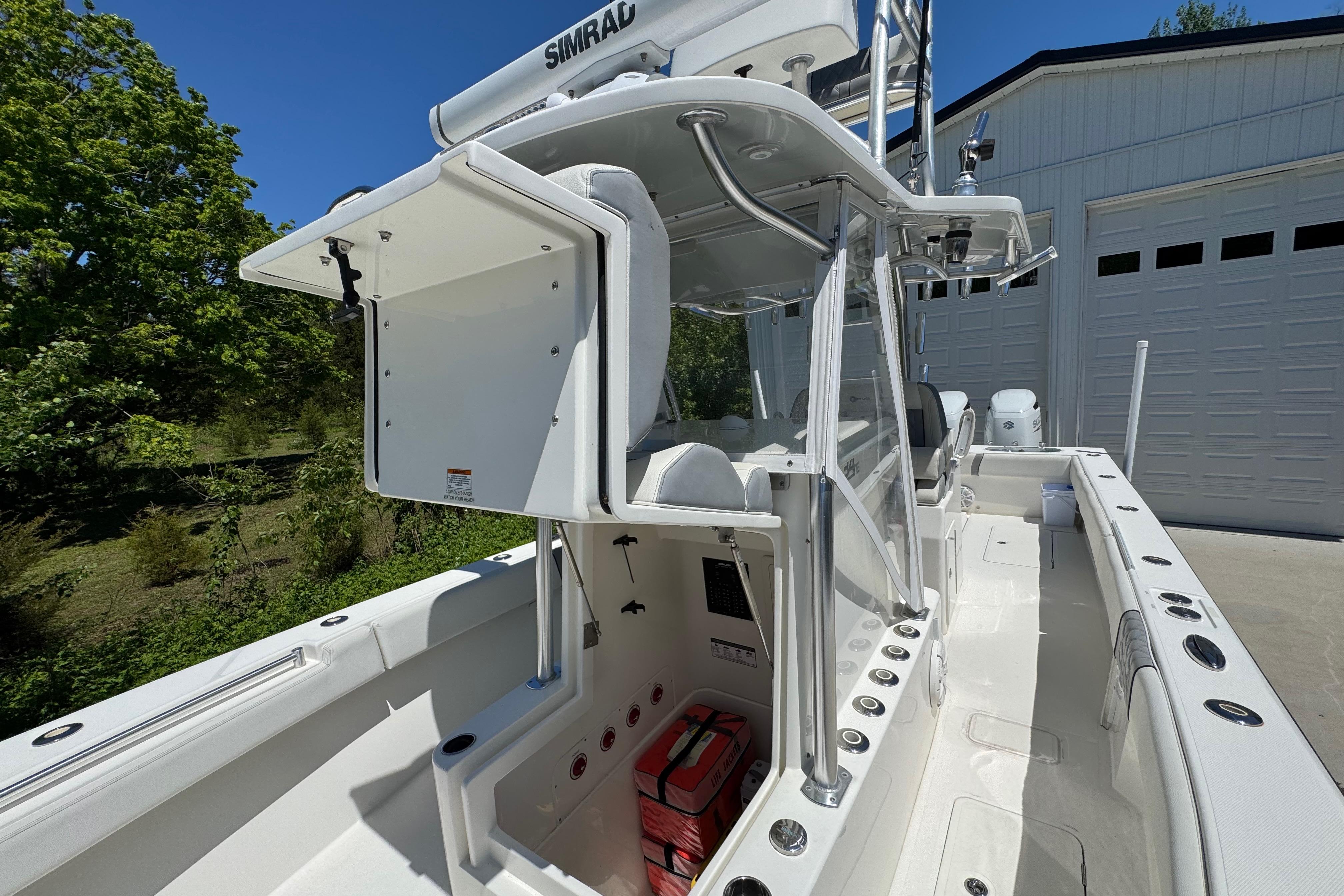 2020 Sea-Lion 34 TE boat with center console and fishing rod holders.