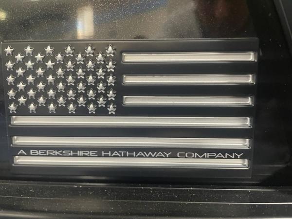 American flag emblem with "A Berkshire Hathaway Company" text on South Bay 525 RS 3.0 Arch.