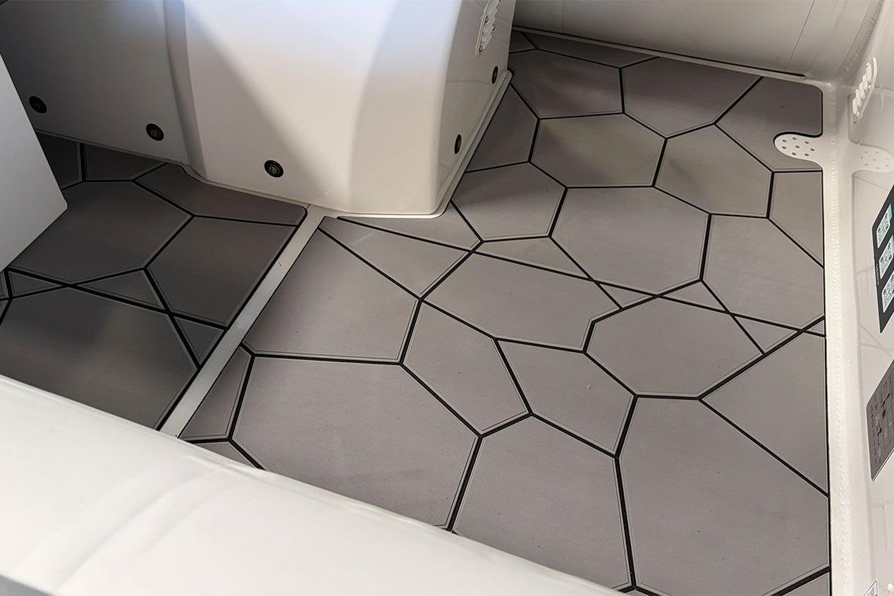 Interior flooring of 2026 Highfield Sport 460 boat with geometric design.