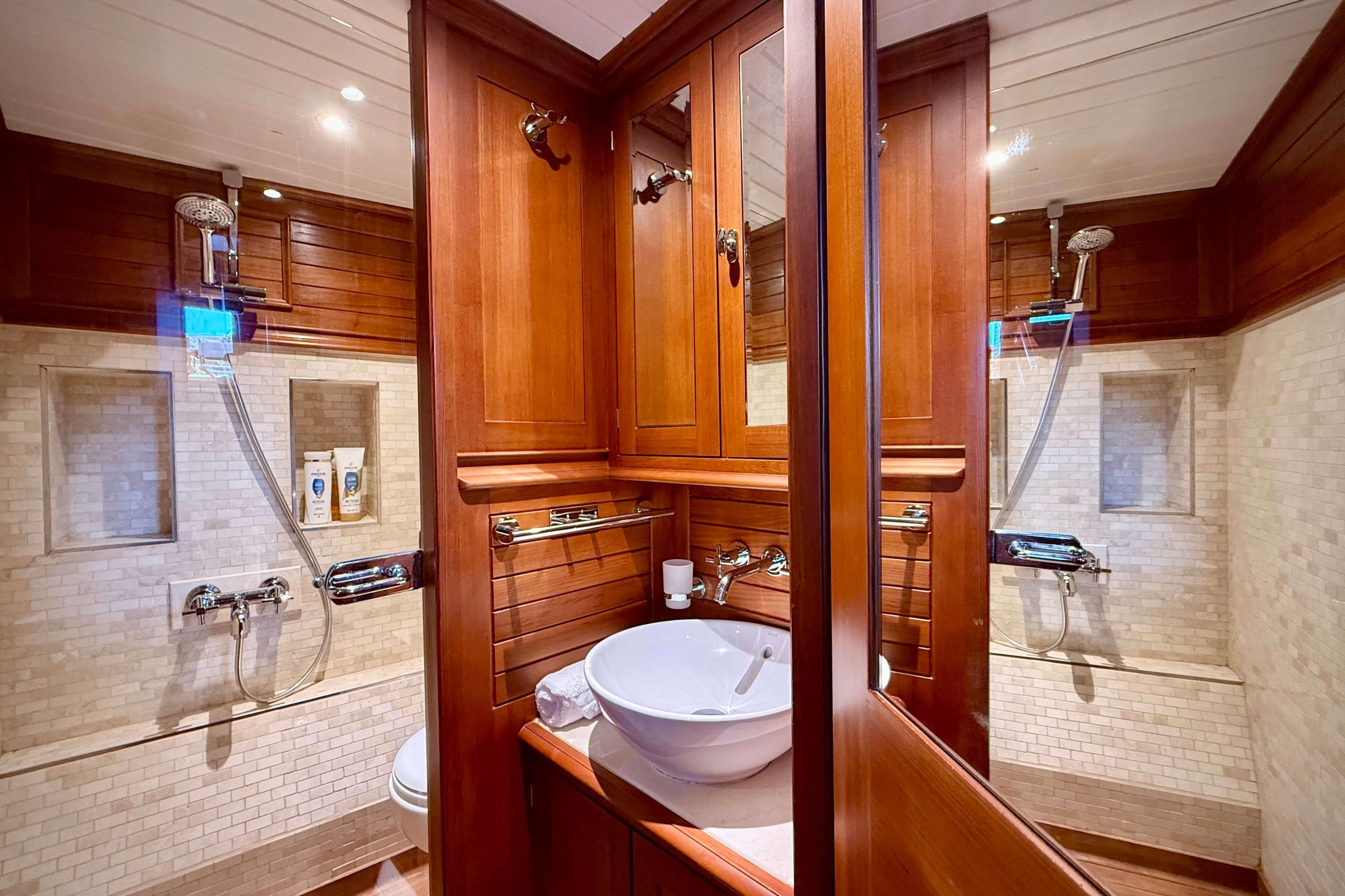 Luxurious wooden bathroom interior on Hoek Design Truly Classic 108 yacht, 2012 model.